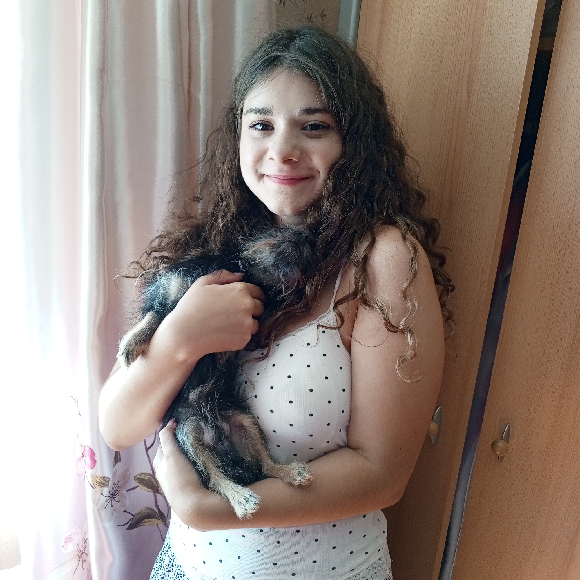 Casual portrait session with a small dog, same outfit