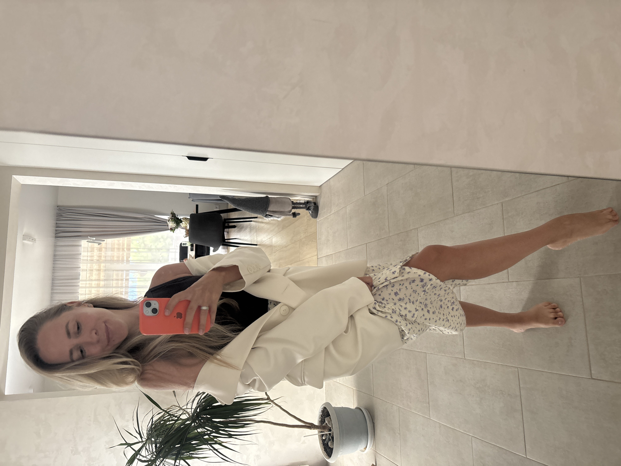 Mirror selfie session in a Chaikovsky room, floral skirt and blazer