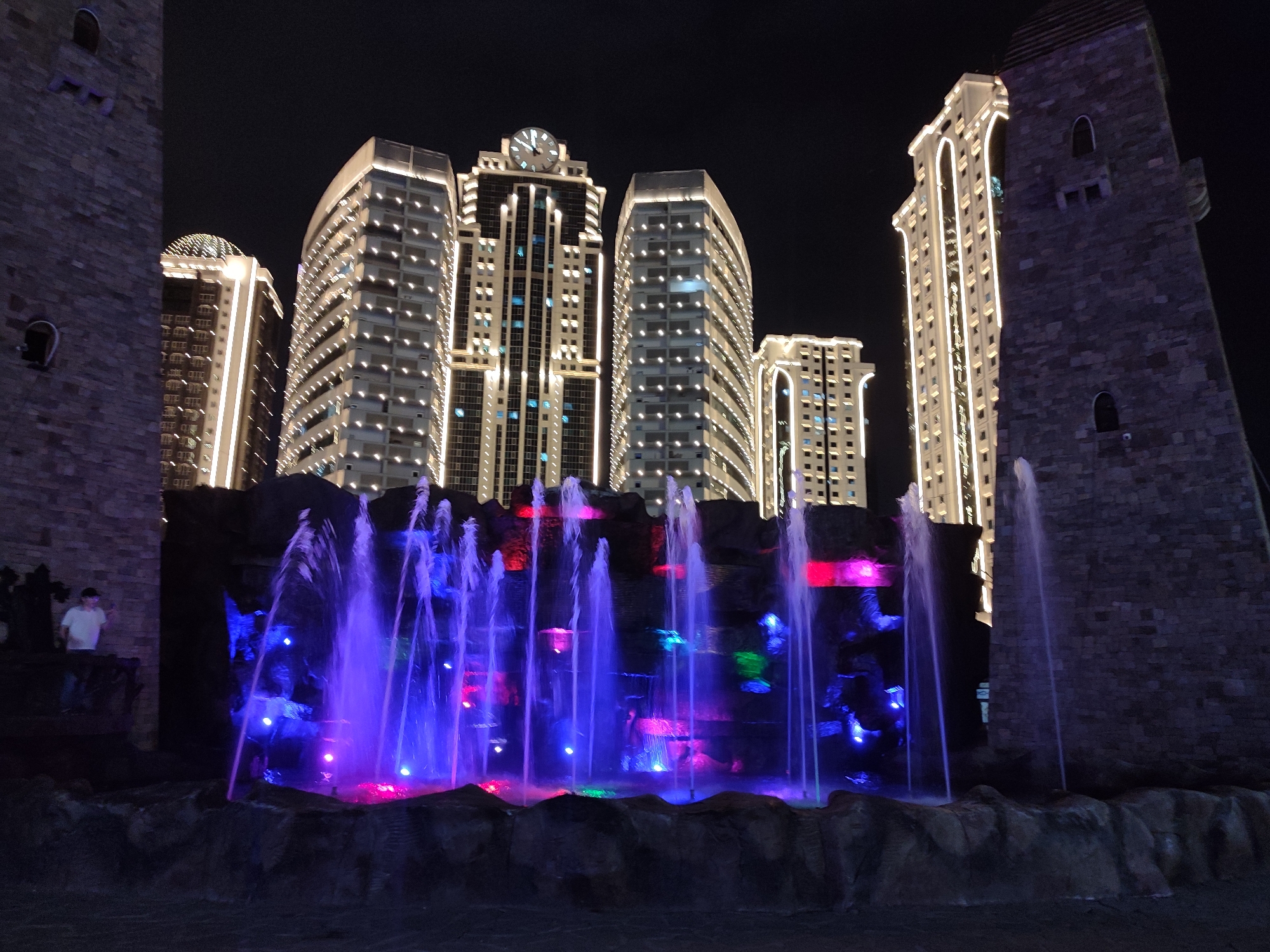 Grozny City towers and lit fountains after dark