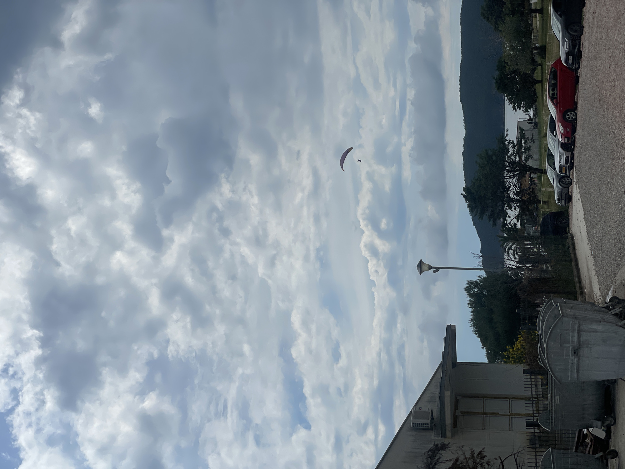 Paraglider spotted over Boreti, Montenegro landscape