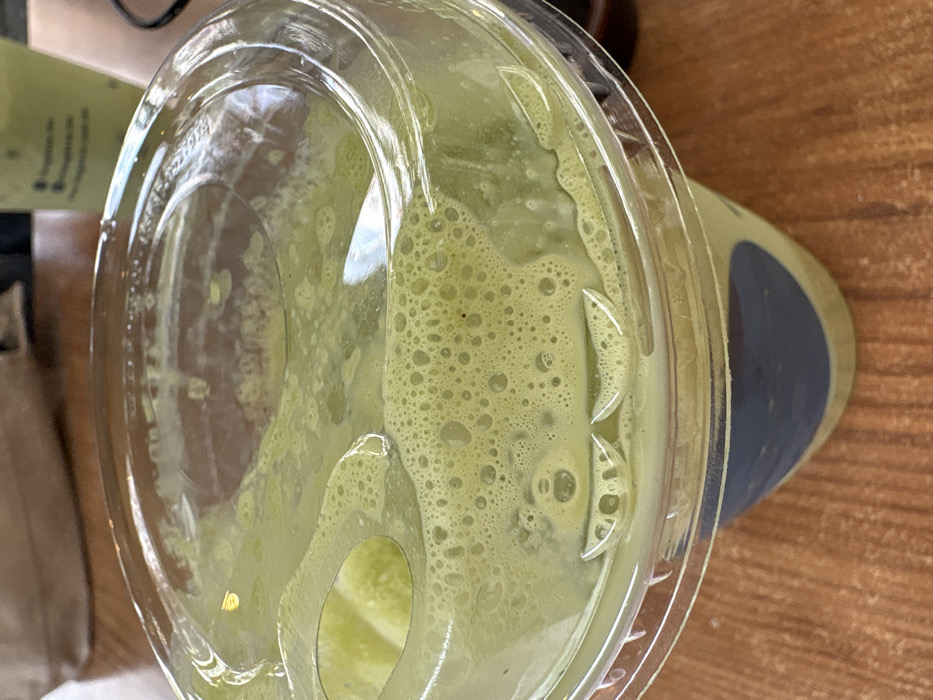 Customer enjoys smoothies and pastries at Mexico City bakery
