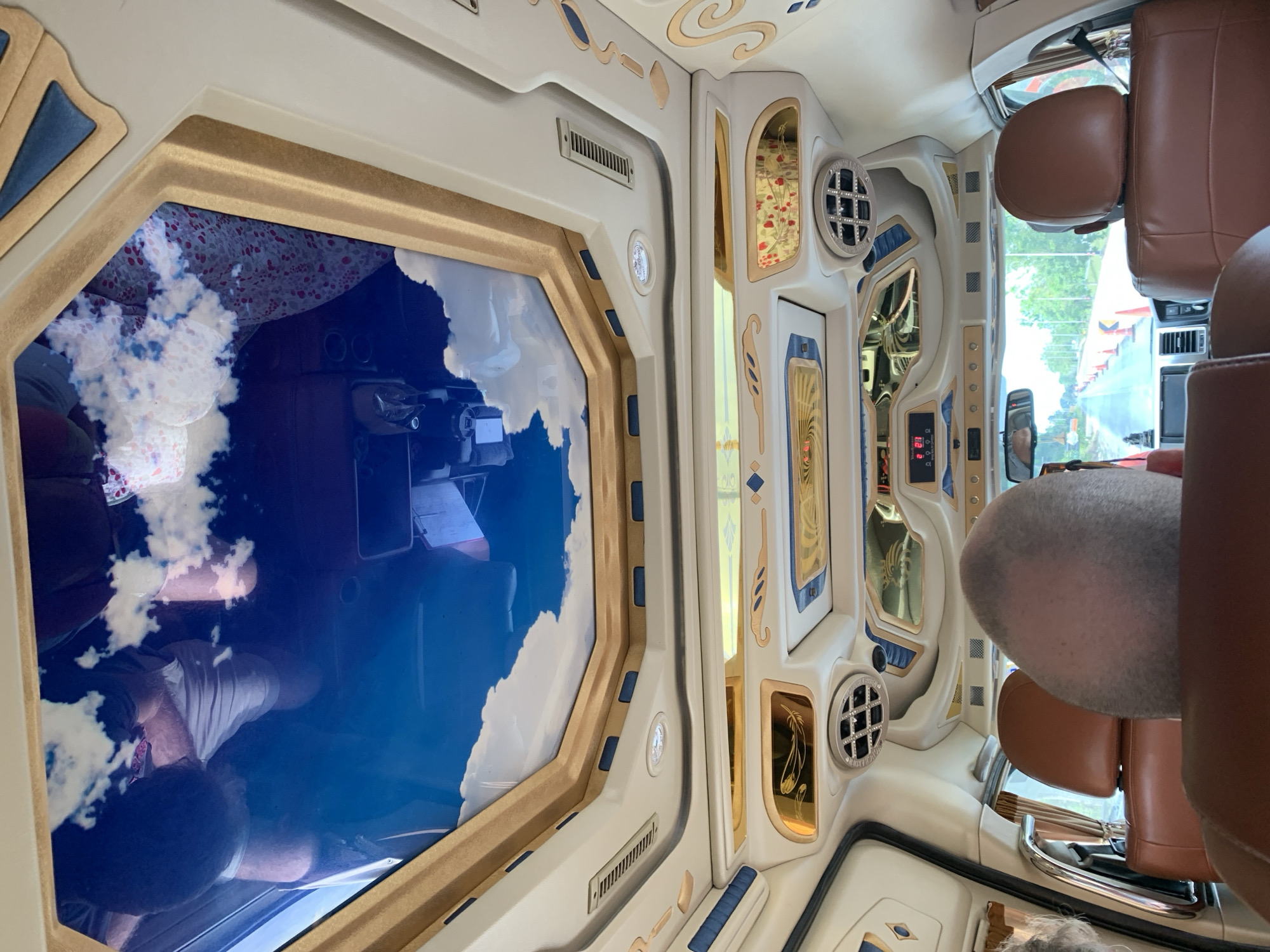 Ornately decorated van interior observed in Thailand