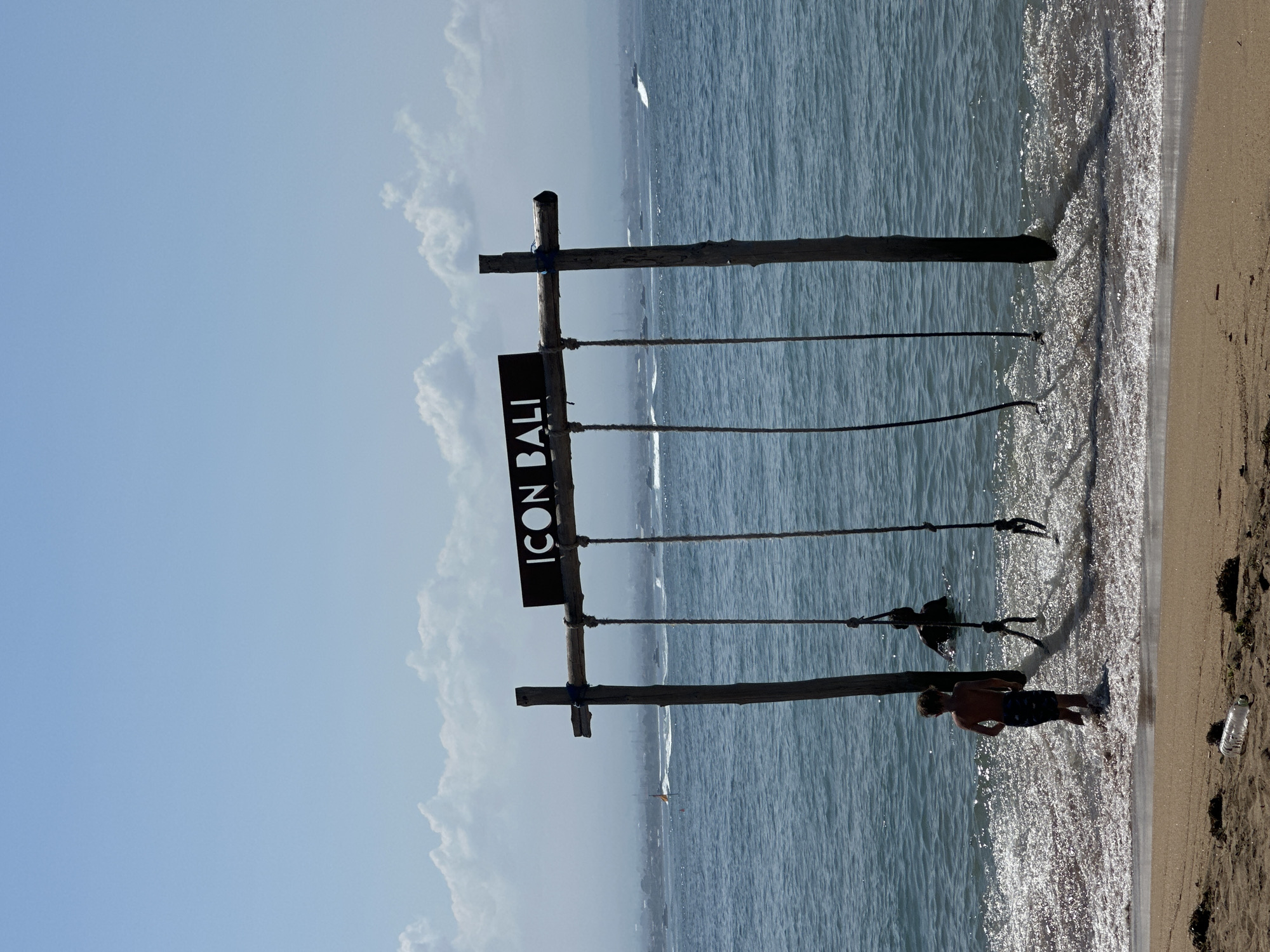 Beach, resort, and street-level snapshots around Denpasar, Bali