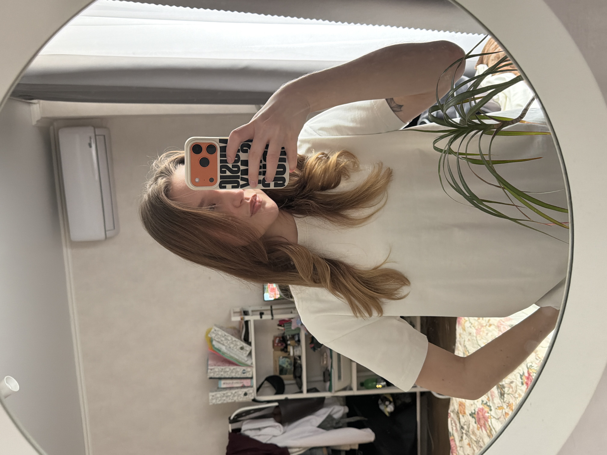 Woman takes selfies and casual photos indoors in Krasnodar