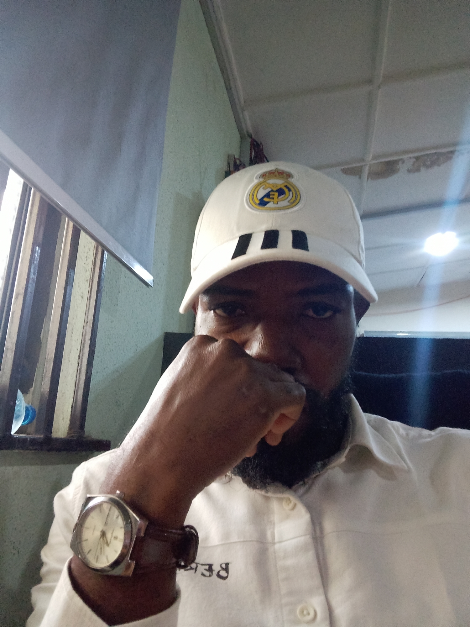 Midday downtime in Lagos, food and a Real Madrid cap