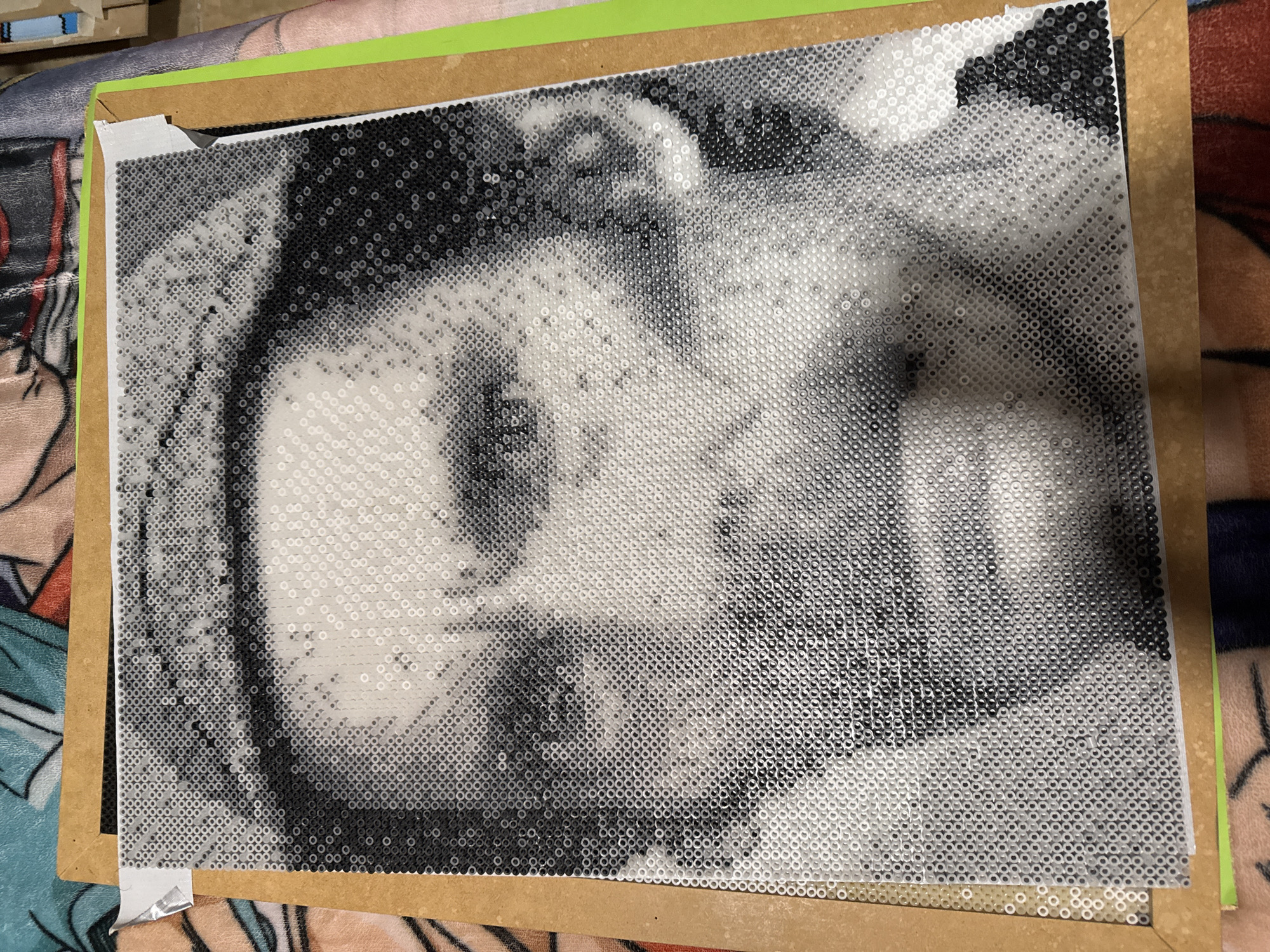 Artist completes intricate bead portrait in early morning Puebla session