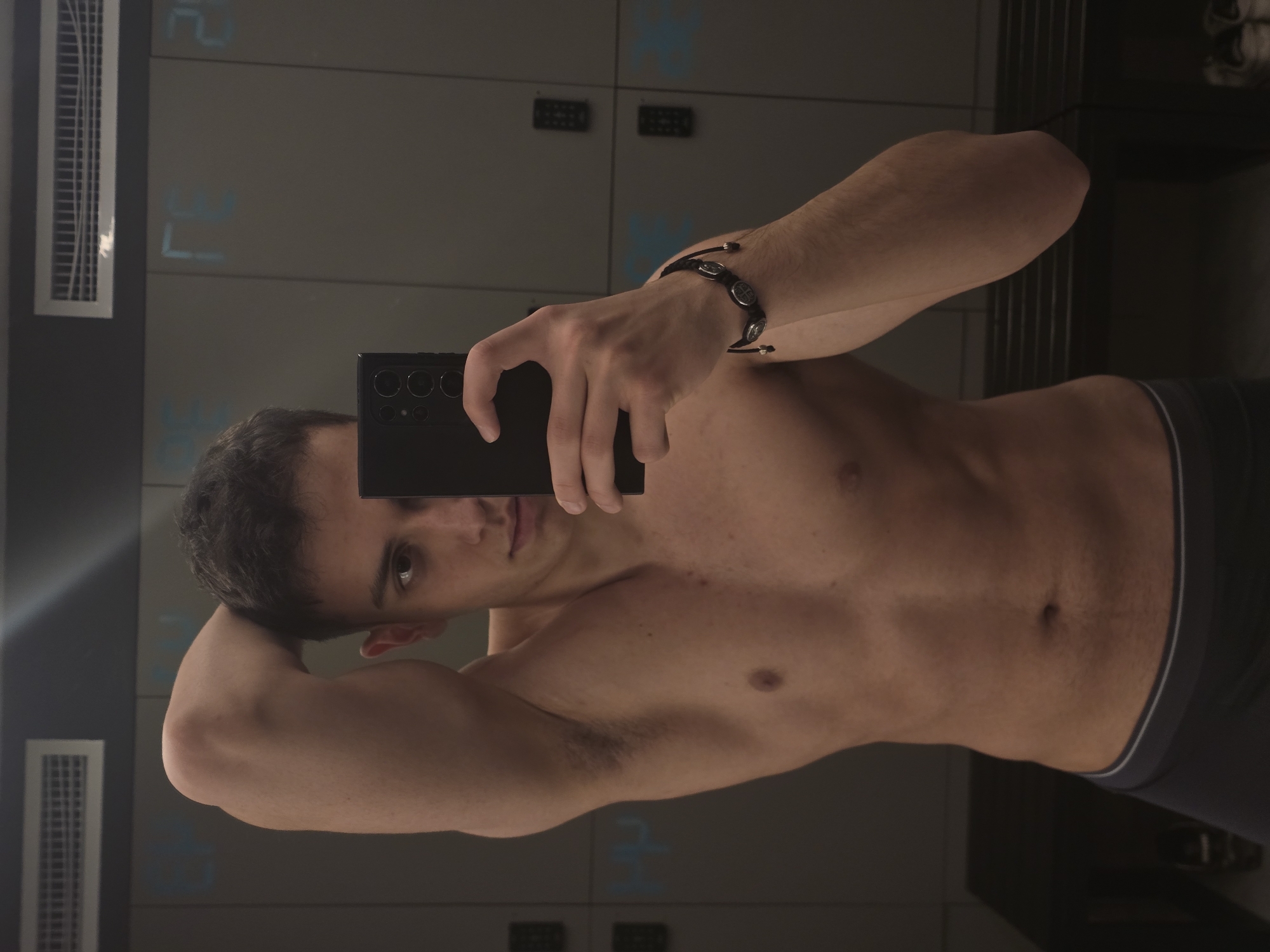 Man takes selfies in Yerevan gym locker room