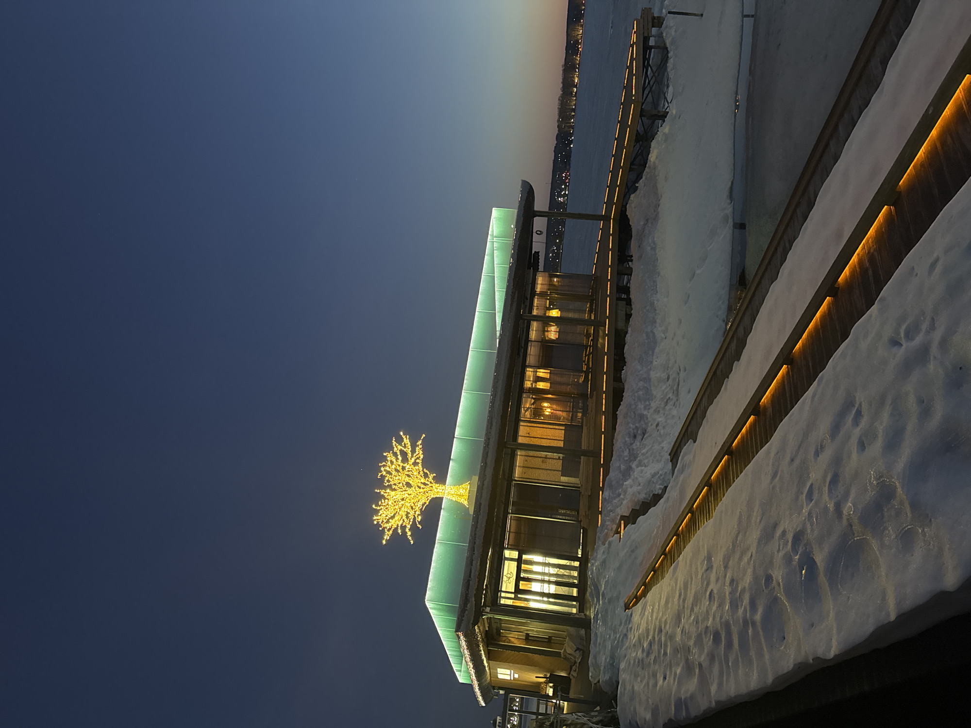 Evening architecture photography captures snowy Votkinsk buildings with lights