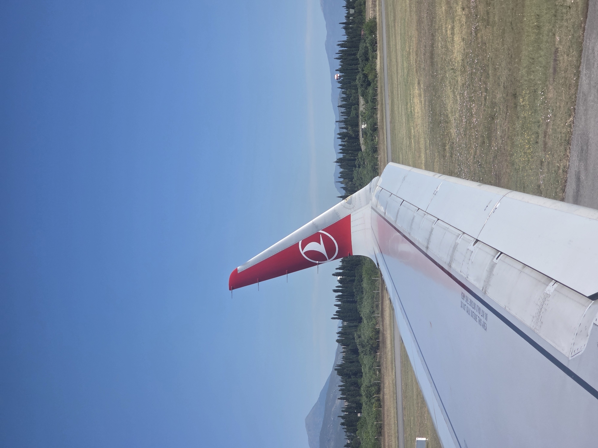 Turkish Airlines flight photographed over Mojanovići, Montenegro runway