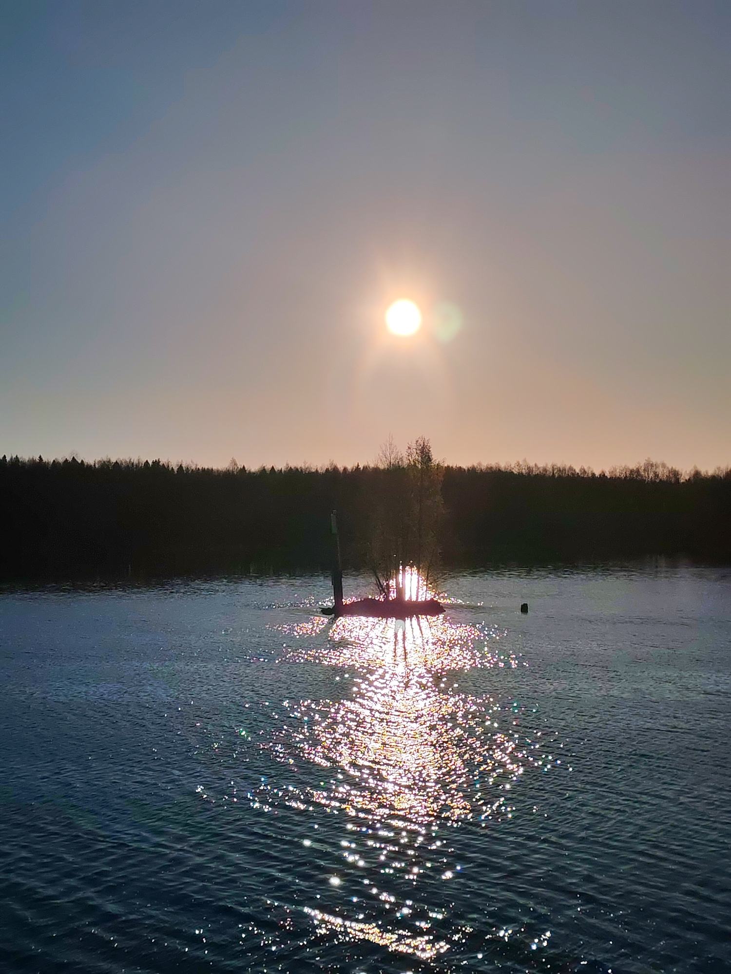 Sunset captured over Russian waterway near Kurdiug