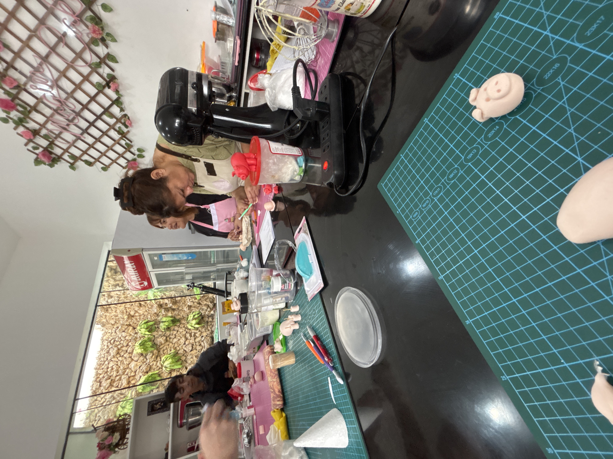 Cake decorating class in session, San Borja, Peru
