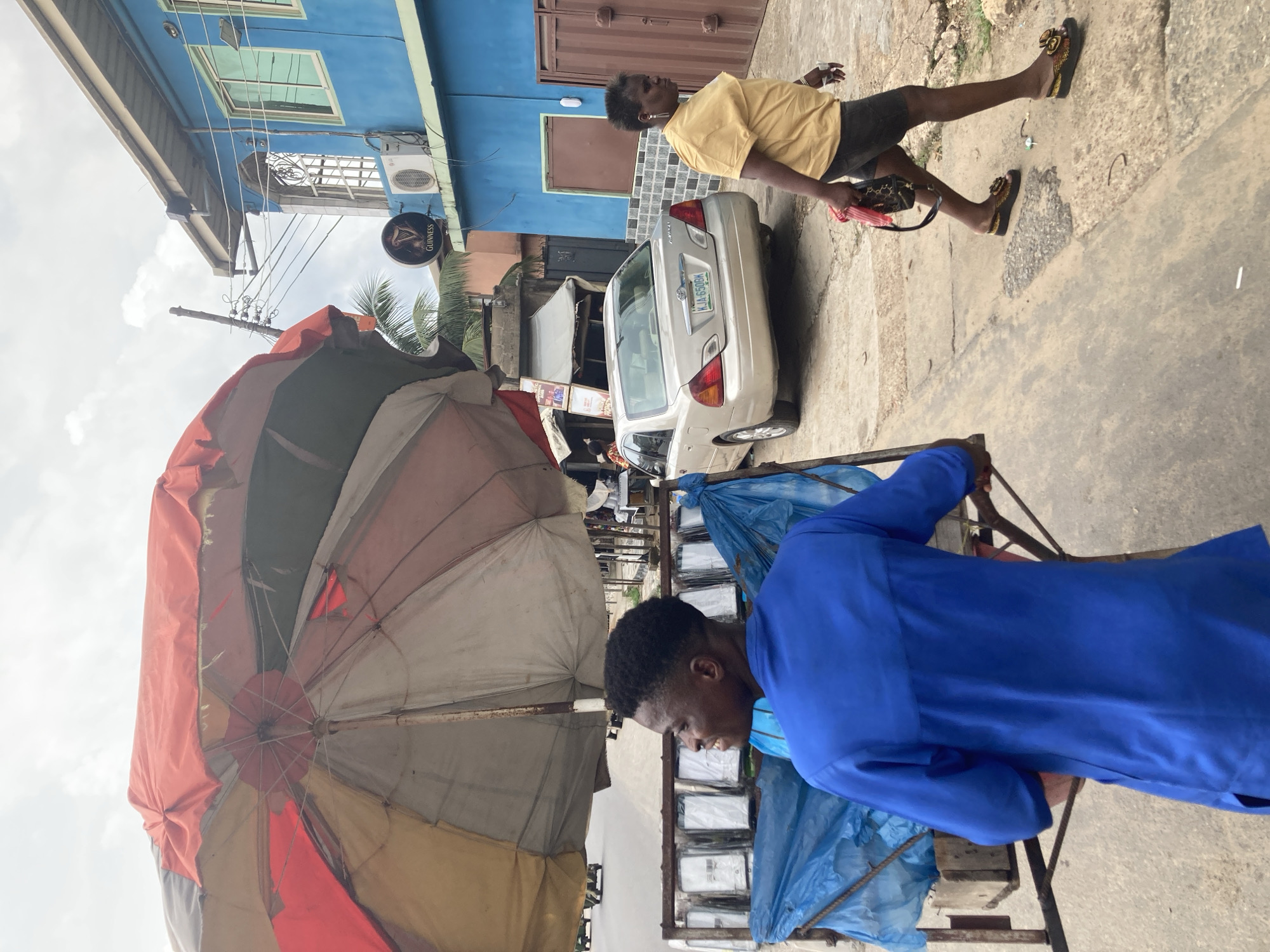 Street life documented in Aba, Nigeria during midday