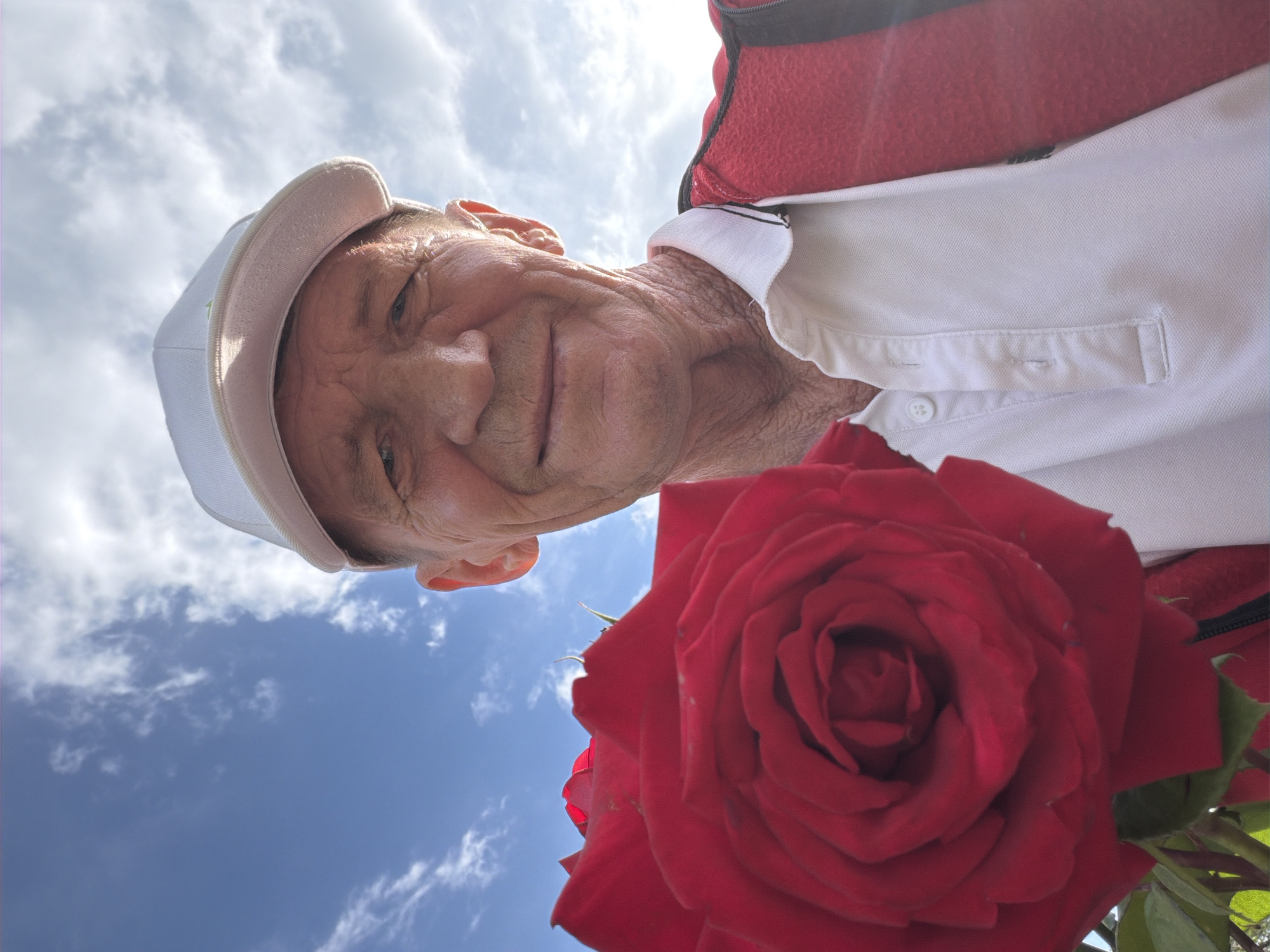 Afternoon stroll through a flowering park, roses and all.