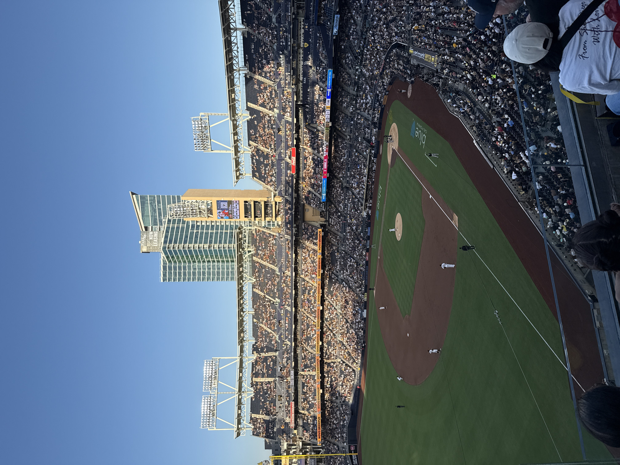 Summer night baseball at a packed San Diego stadium