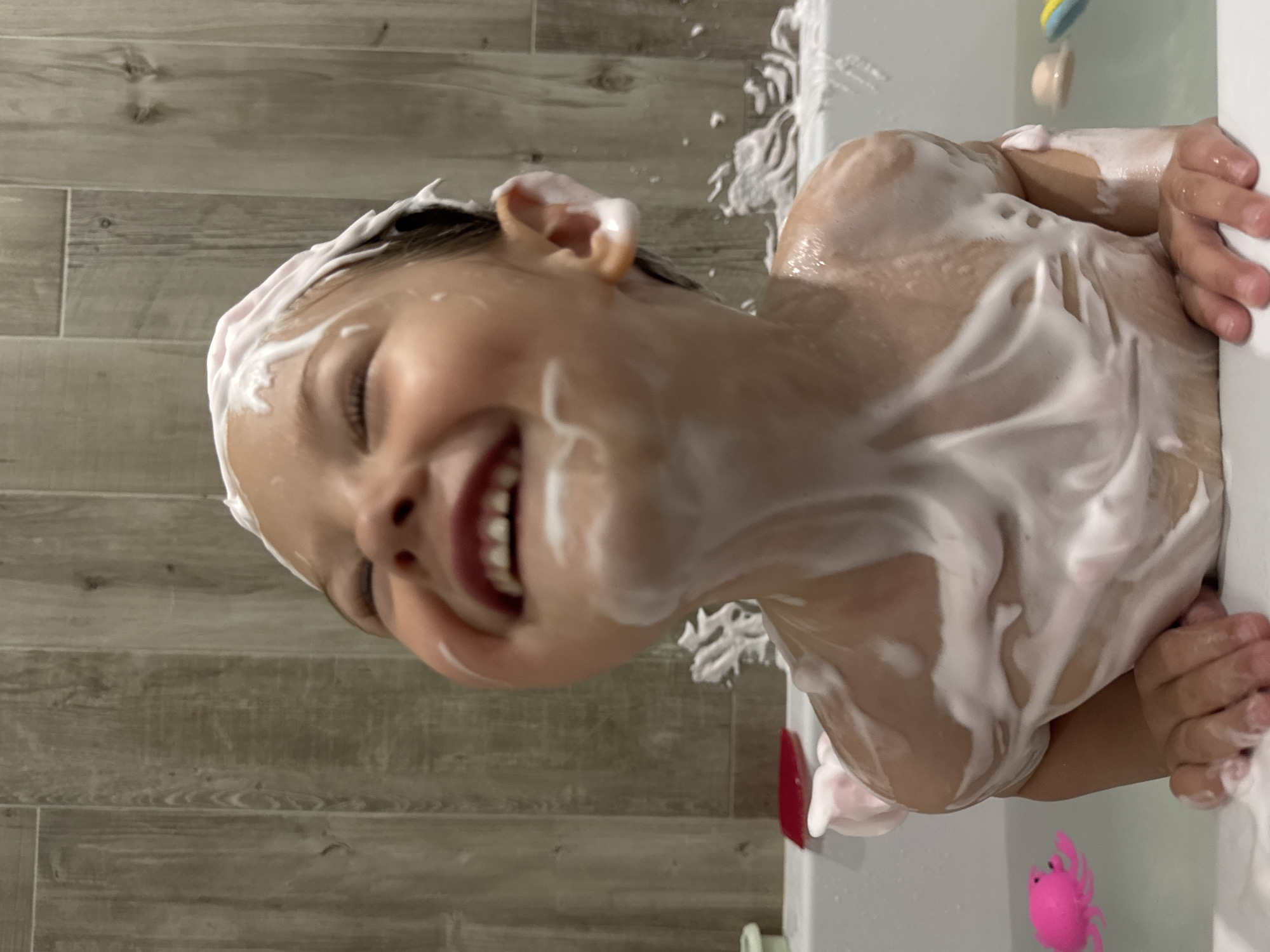 Child's bath time captured in Zelenogradsk bathroom