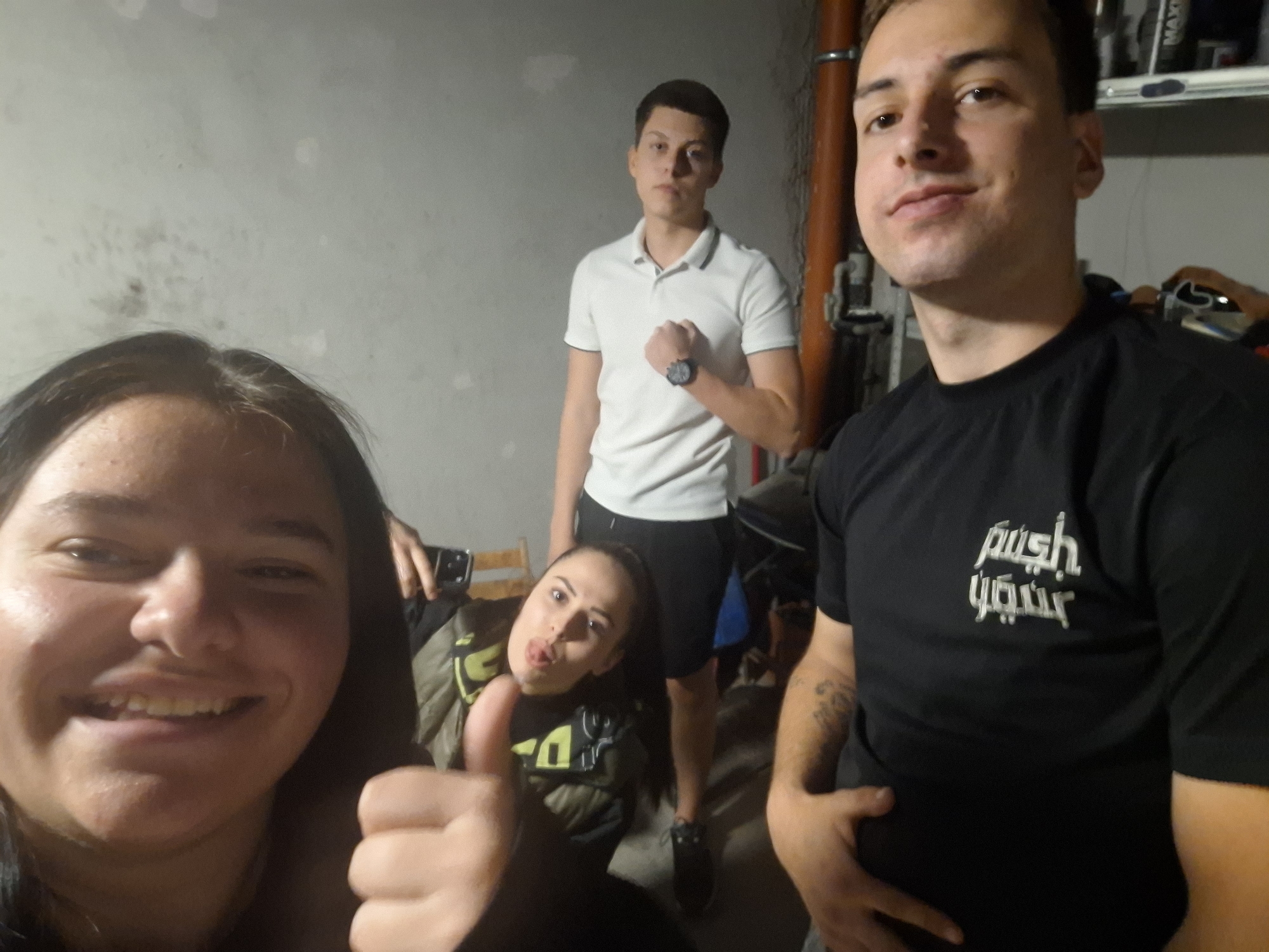 Five people captured in impromptu basement photograph