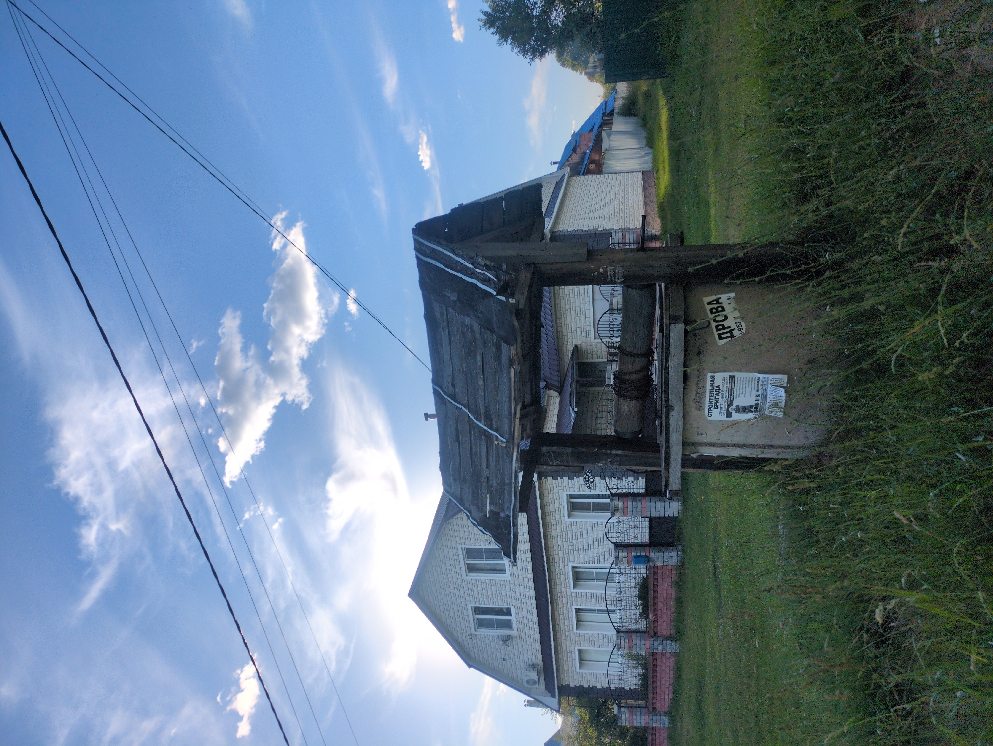 Sunny day in a quiet rural corner of Velikovo, Russia