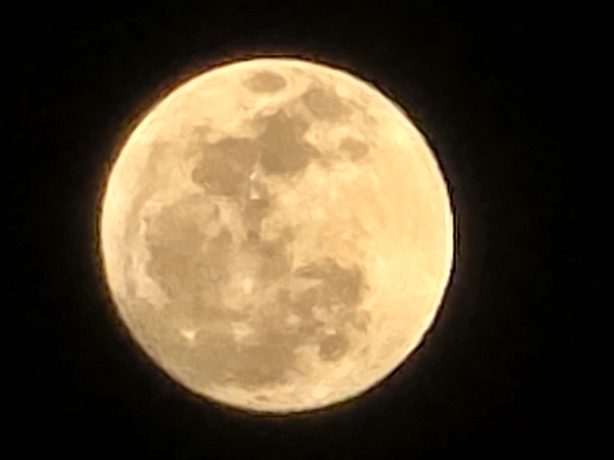 Full moon, multiple angles, craters and golden tone on display
