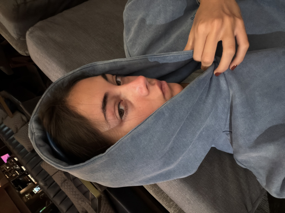 Person photographed relaxing on sofa in Mexico City home