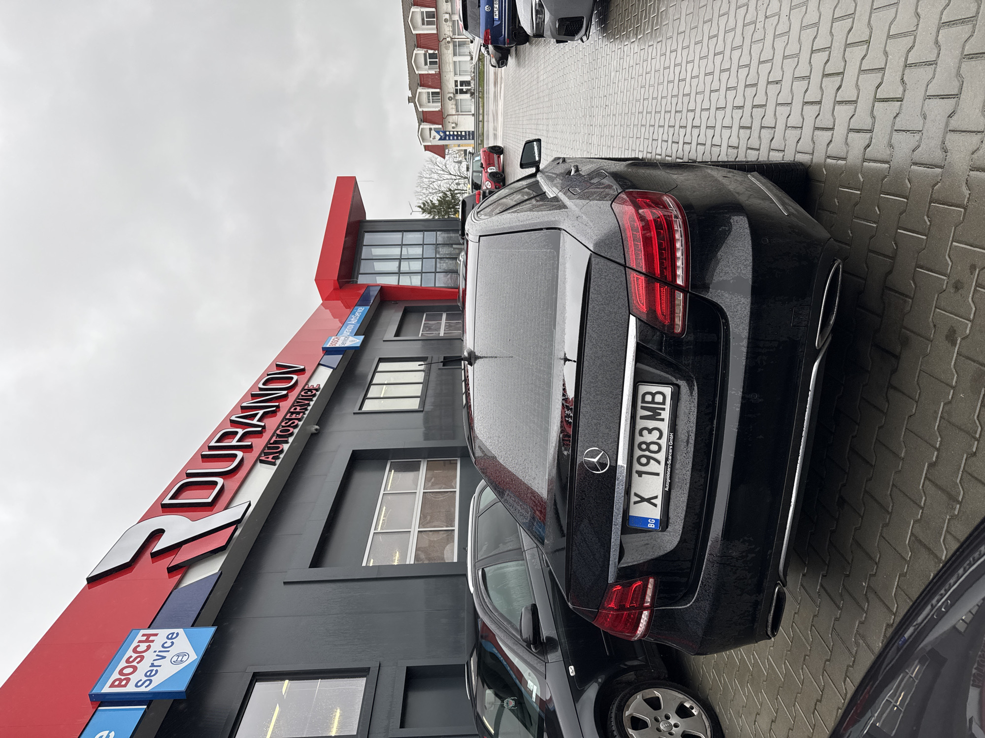Mercedes-Benz parked at auto service shop in Dimitrovgrad