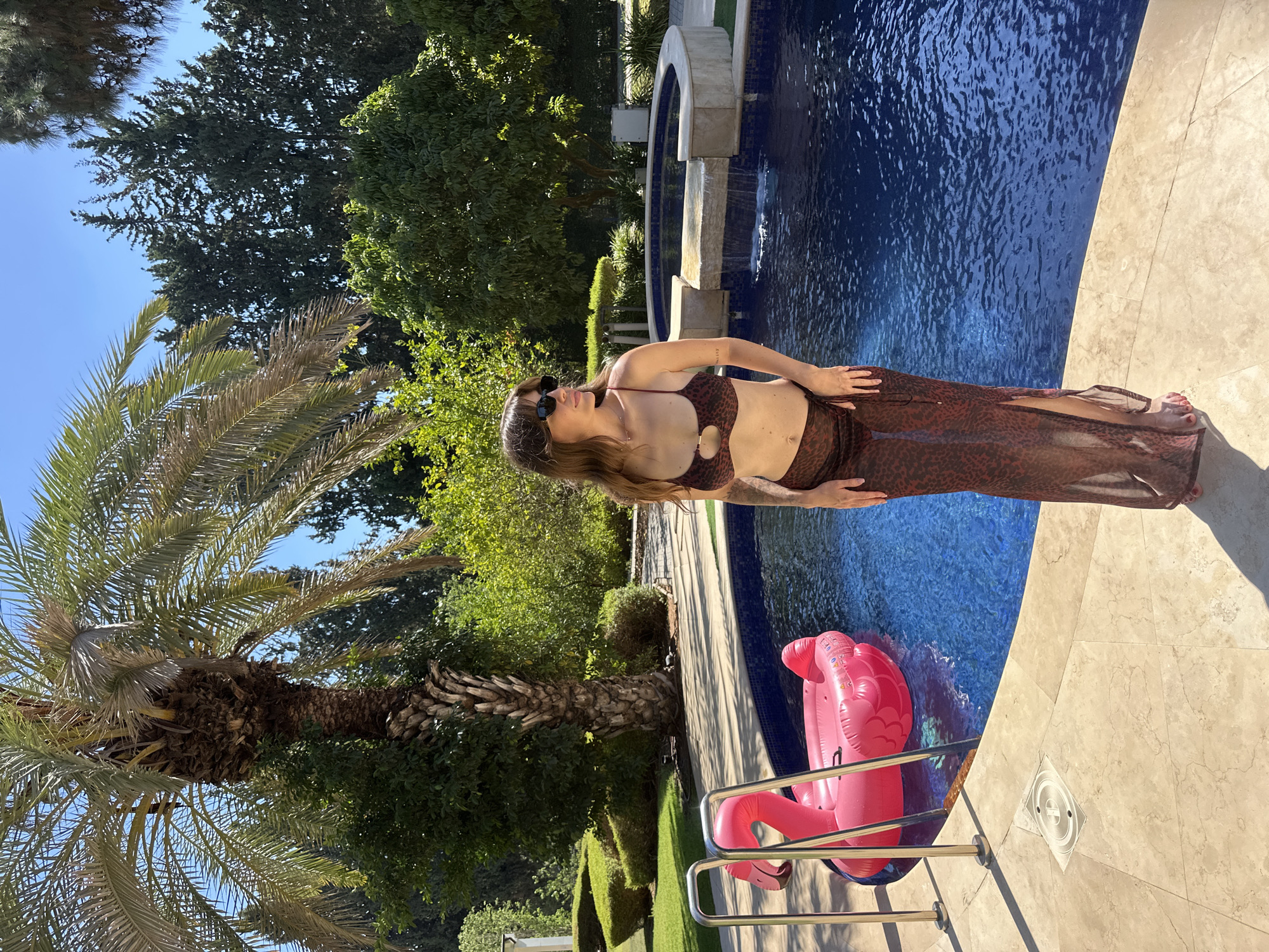 Sunny pool hangout in a Savyon backyard