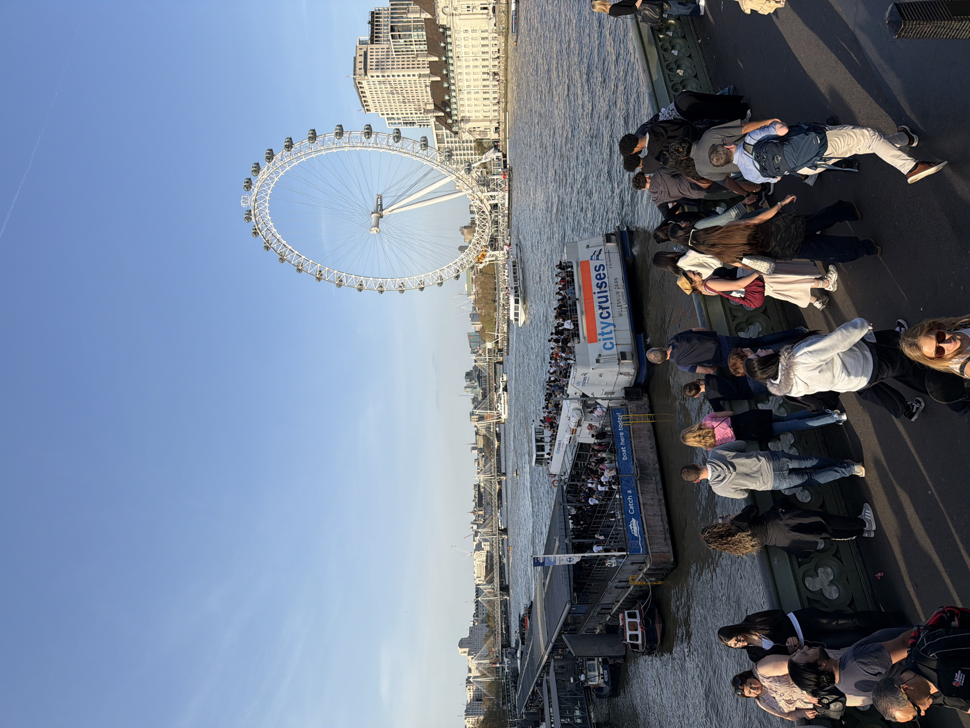 Red tour bus carries passengers through central London