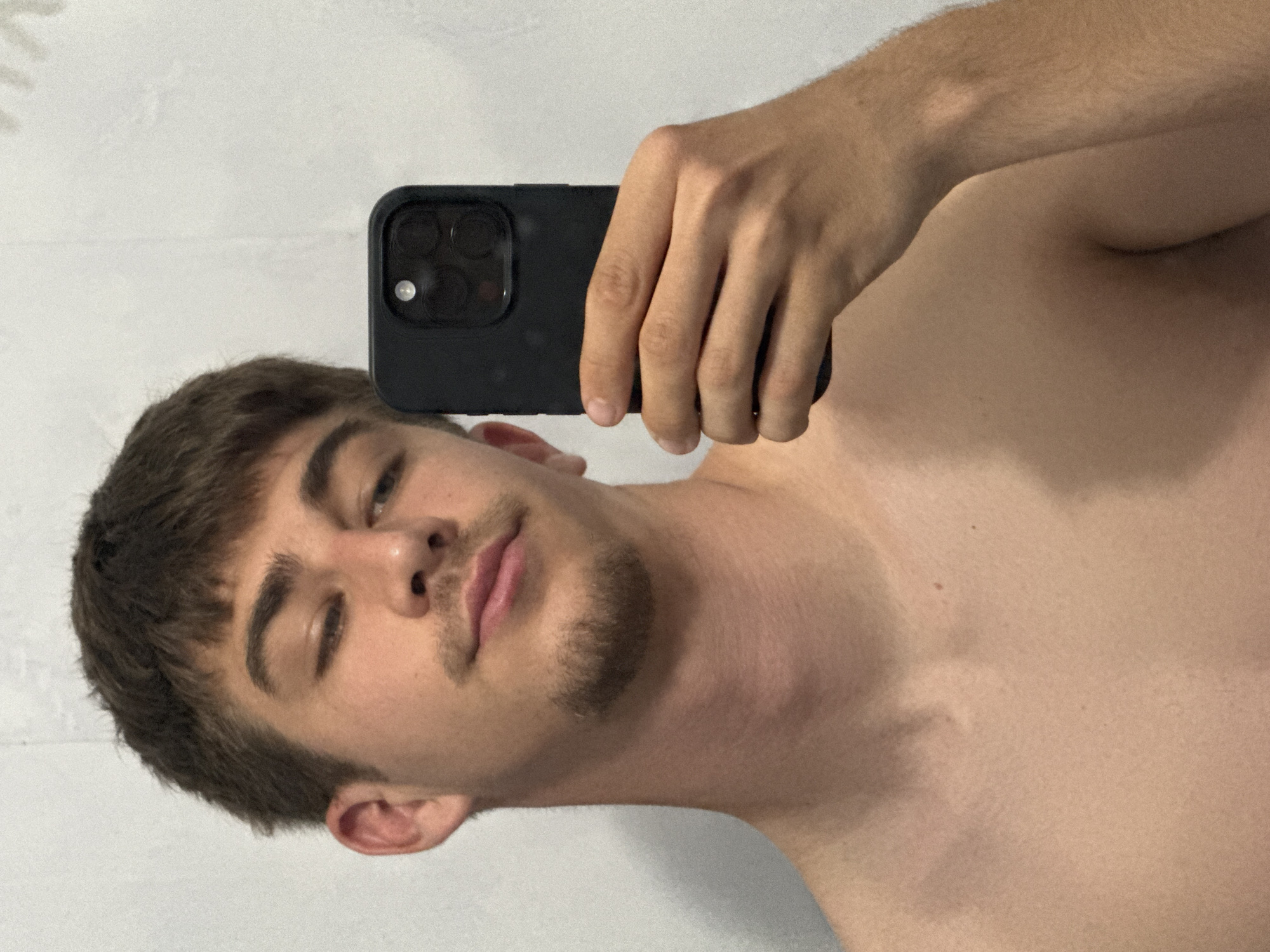 Young man takes indoor selfie in Sofia