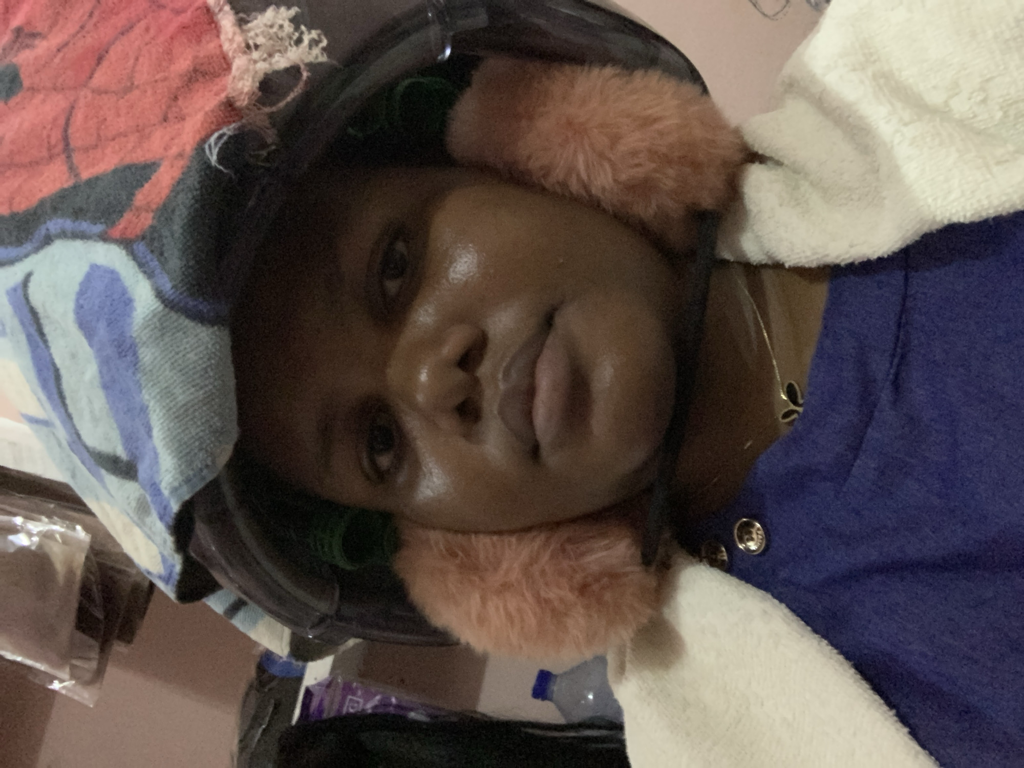 Woman receives hair treatment at Dar es-Salaam salon