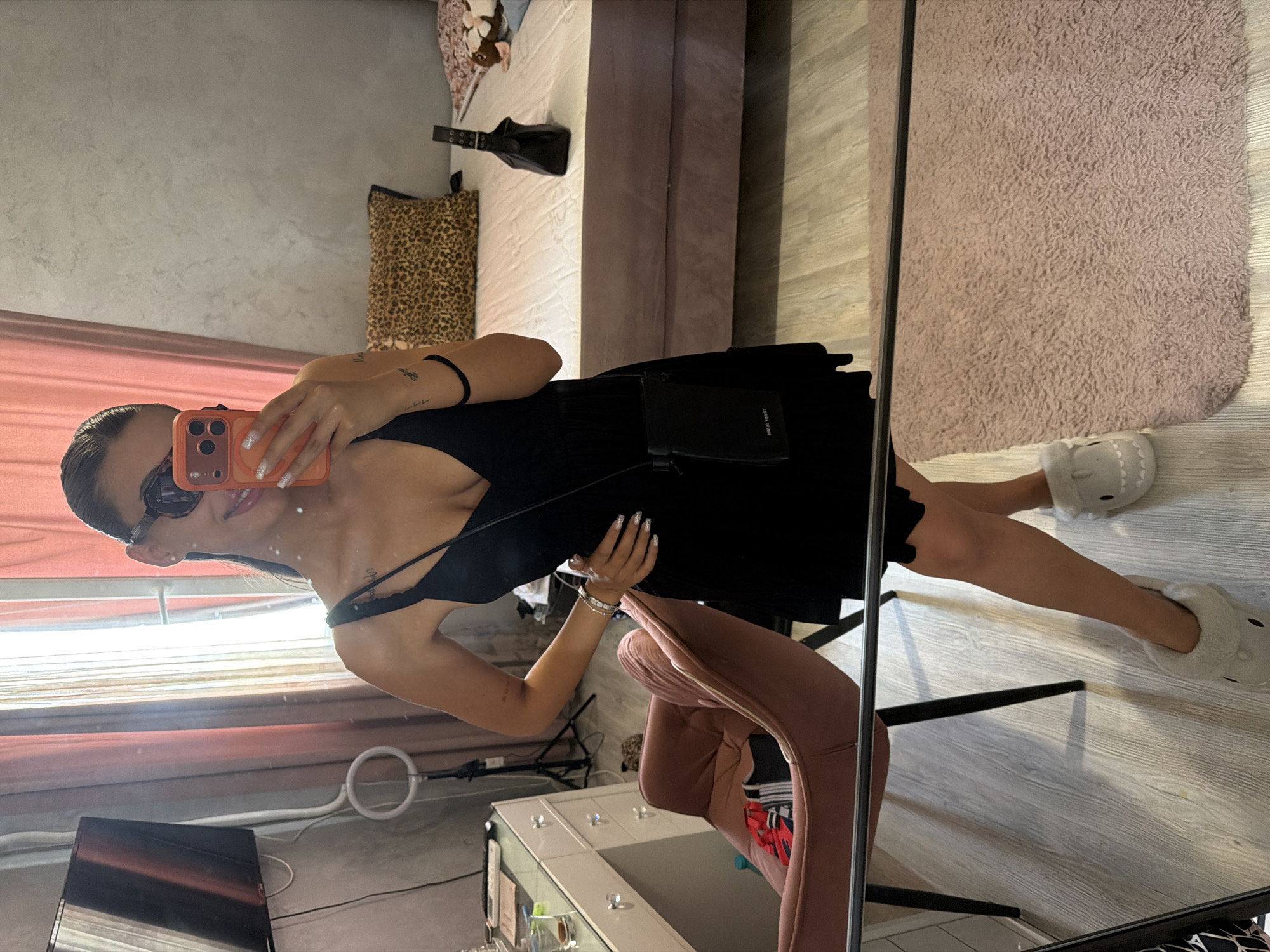 Mirror selfie in Burgas bedroom, black dress and shark slippers
