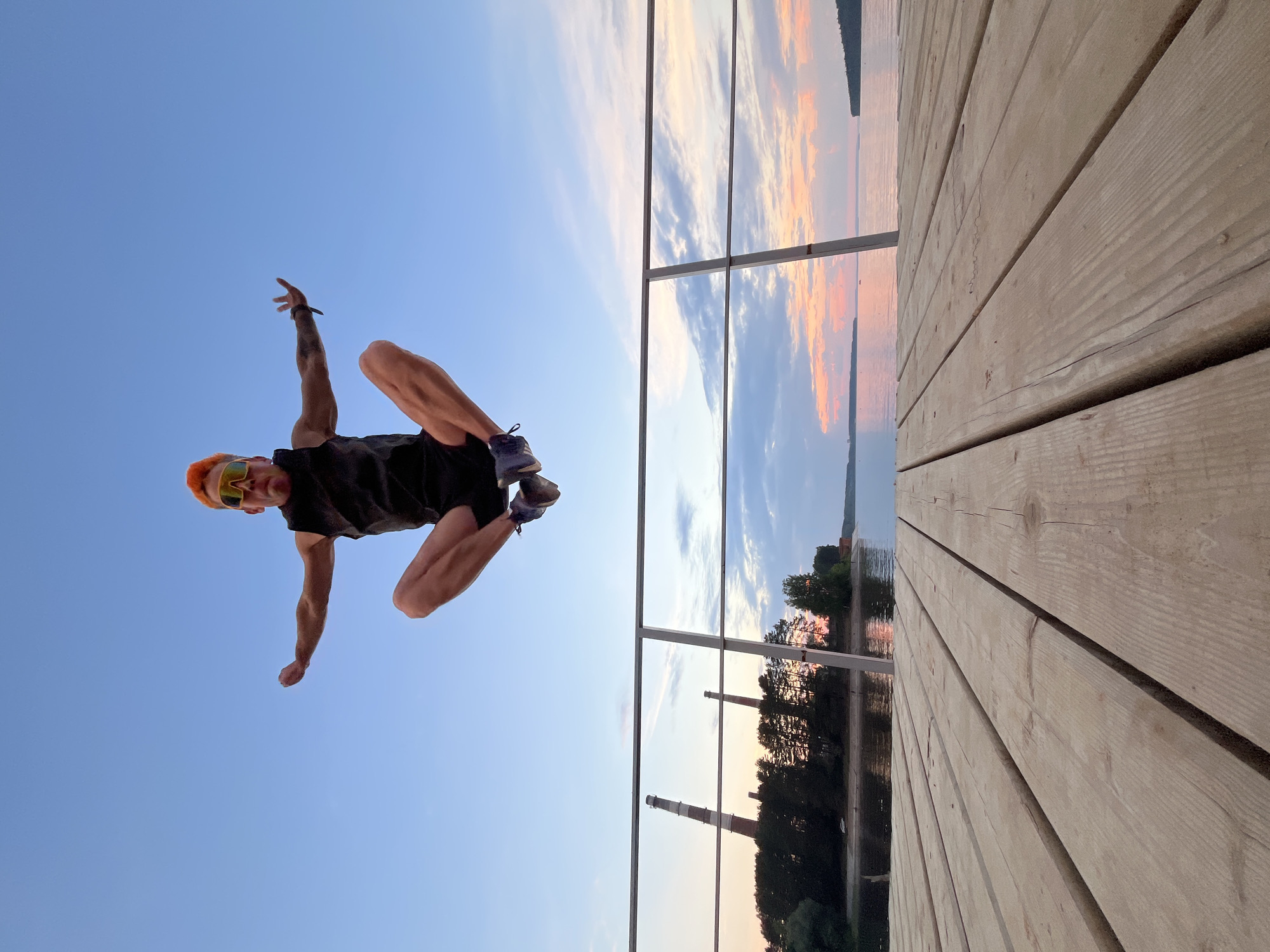 Sunset cycling session on Kama River pier in Chaikovsky