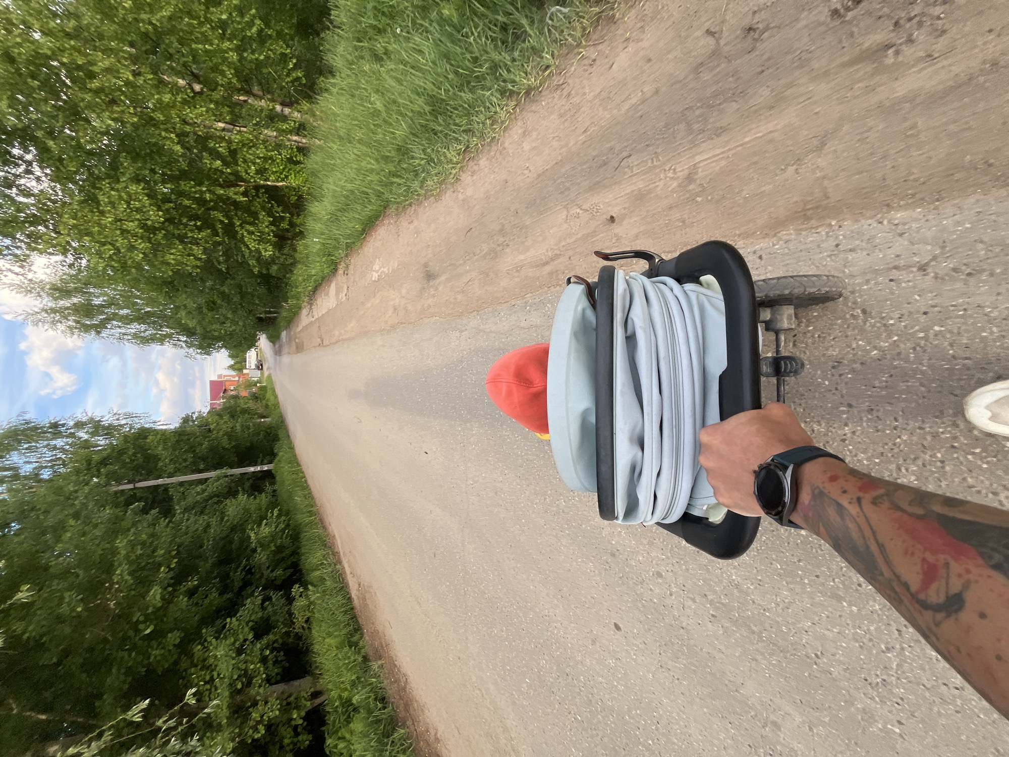 Parent with children enjoys afternoon stroll in Chaikovsky, Russia