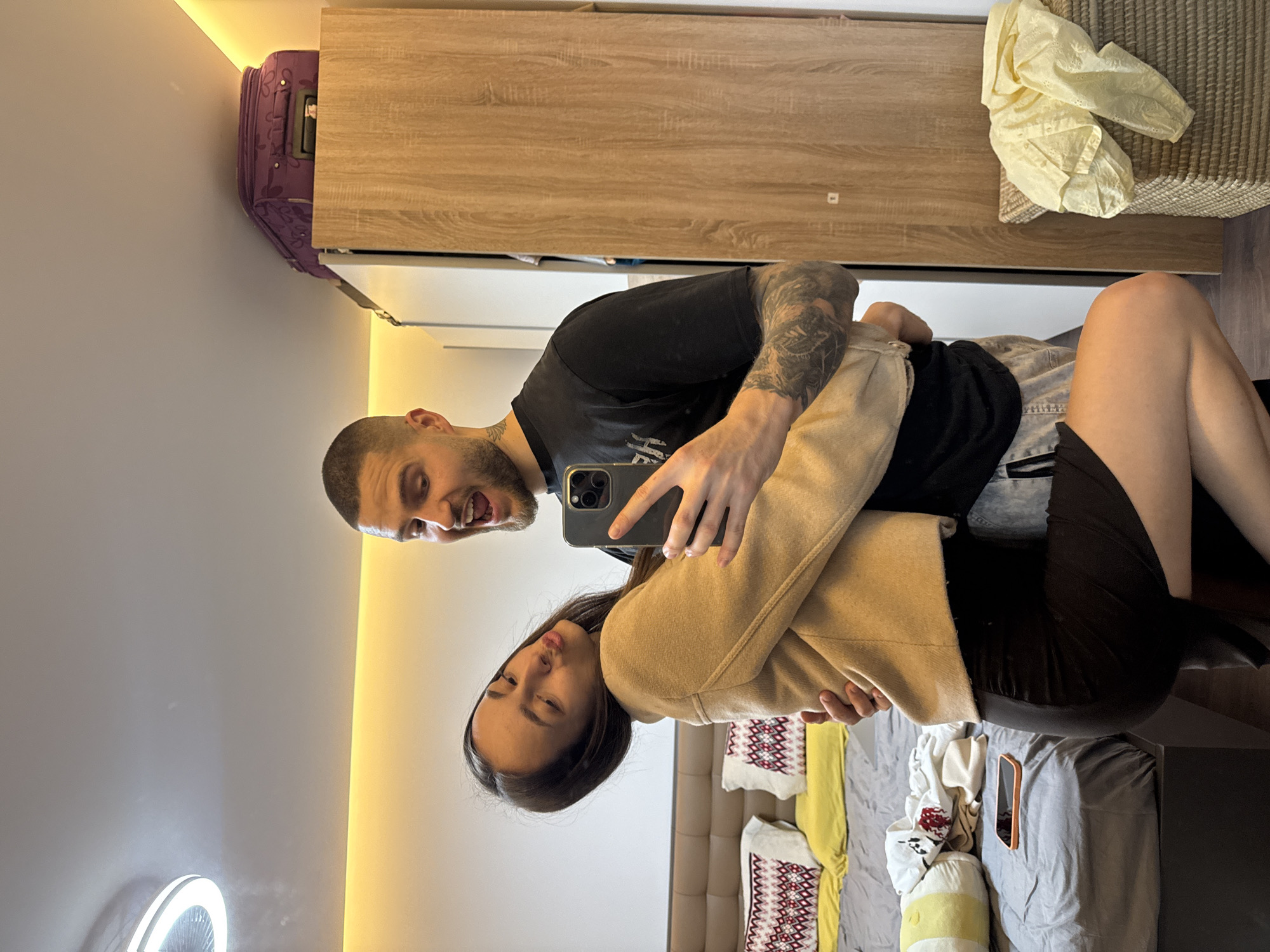 Couple takes selfies in Sofia room Friday evening