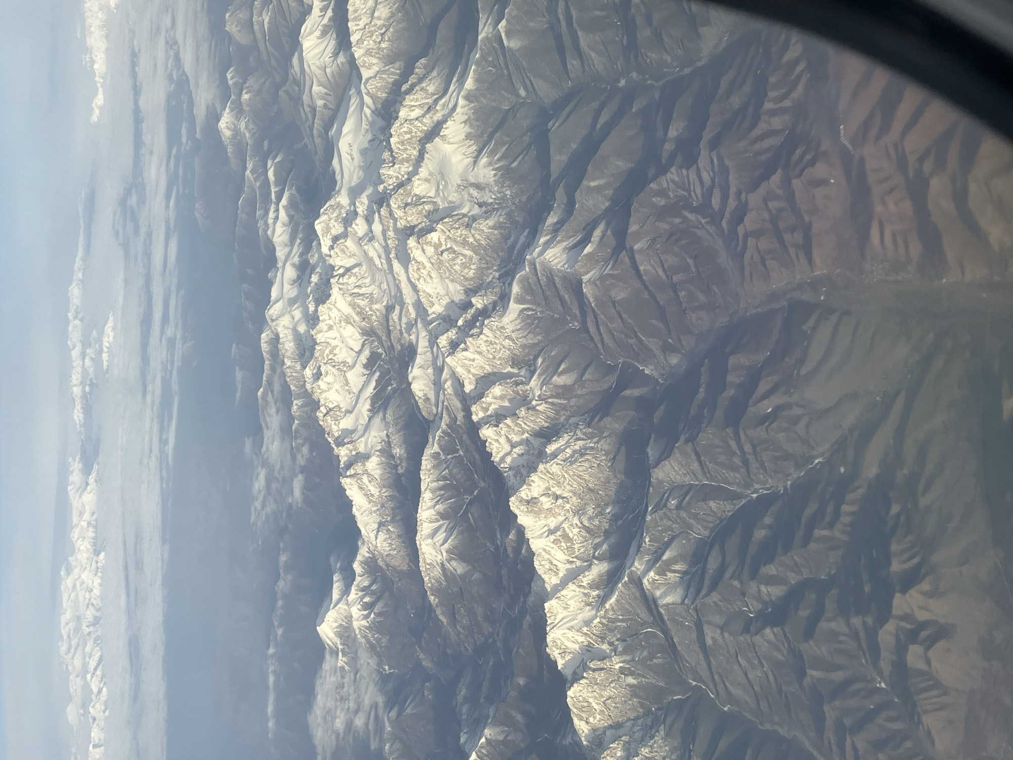Aerial view captures snow-covered mountains near Wuwei, China