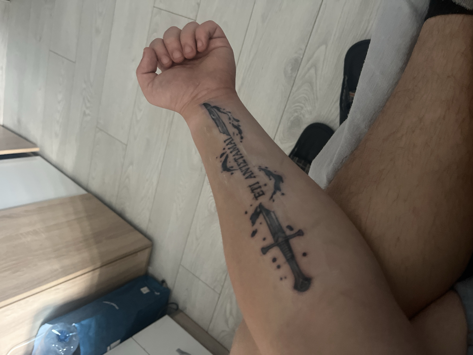 Person with tattoos photographed in Pazardzhik, Bulgaria