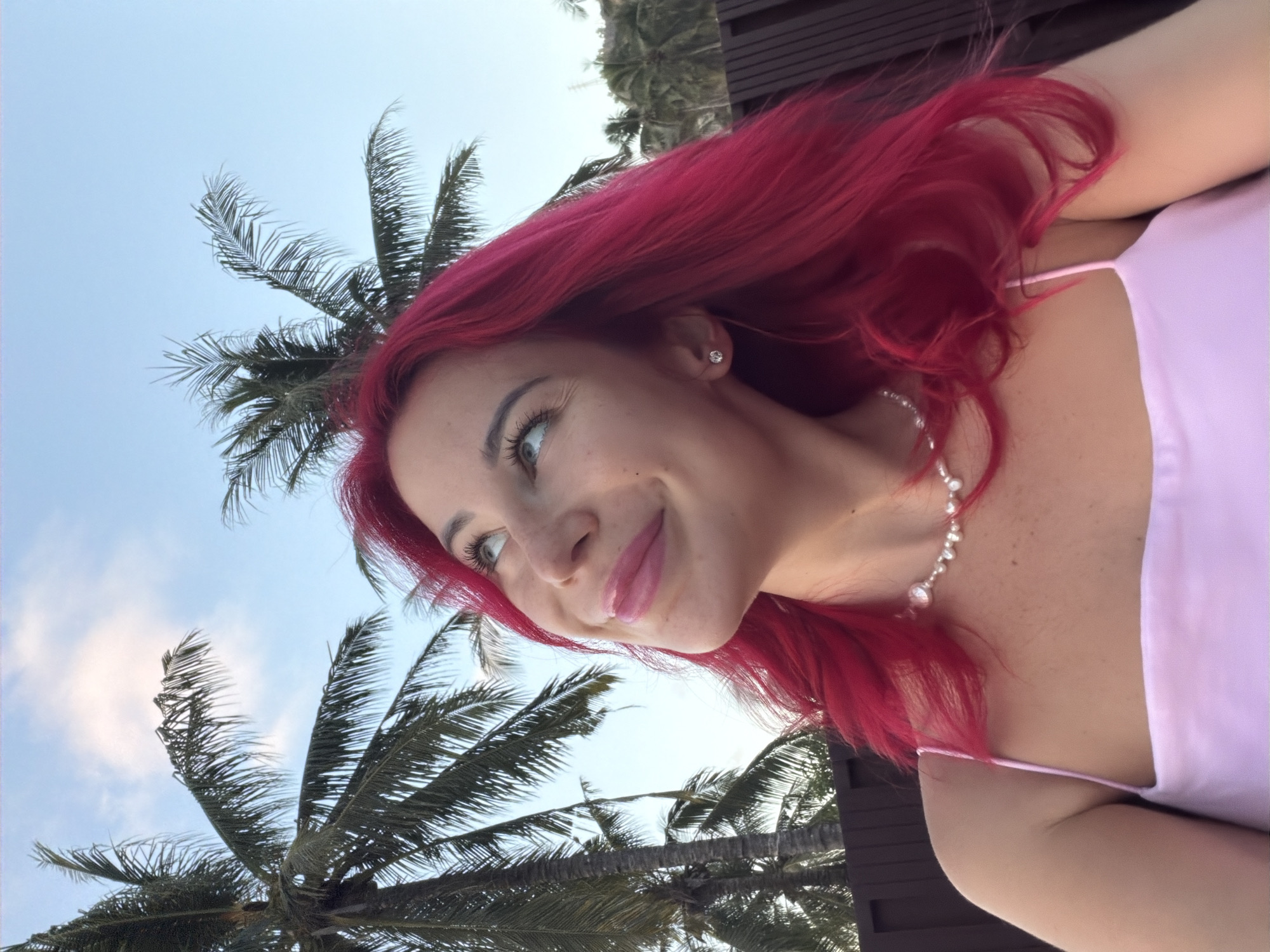 Kuta hotel morning: palm trees, a chic bathroom, and golden hour