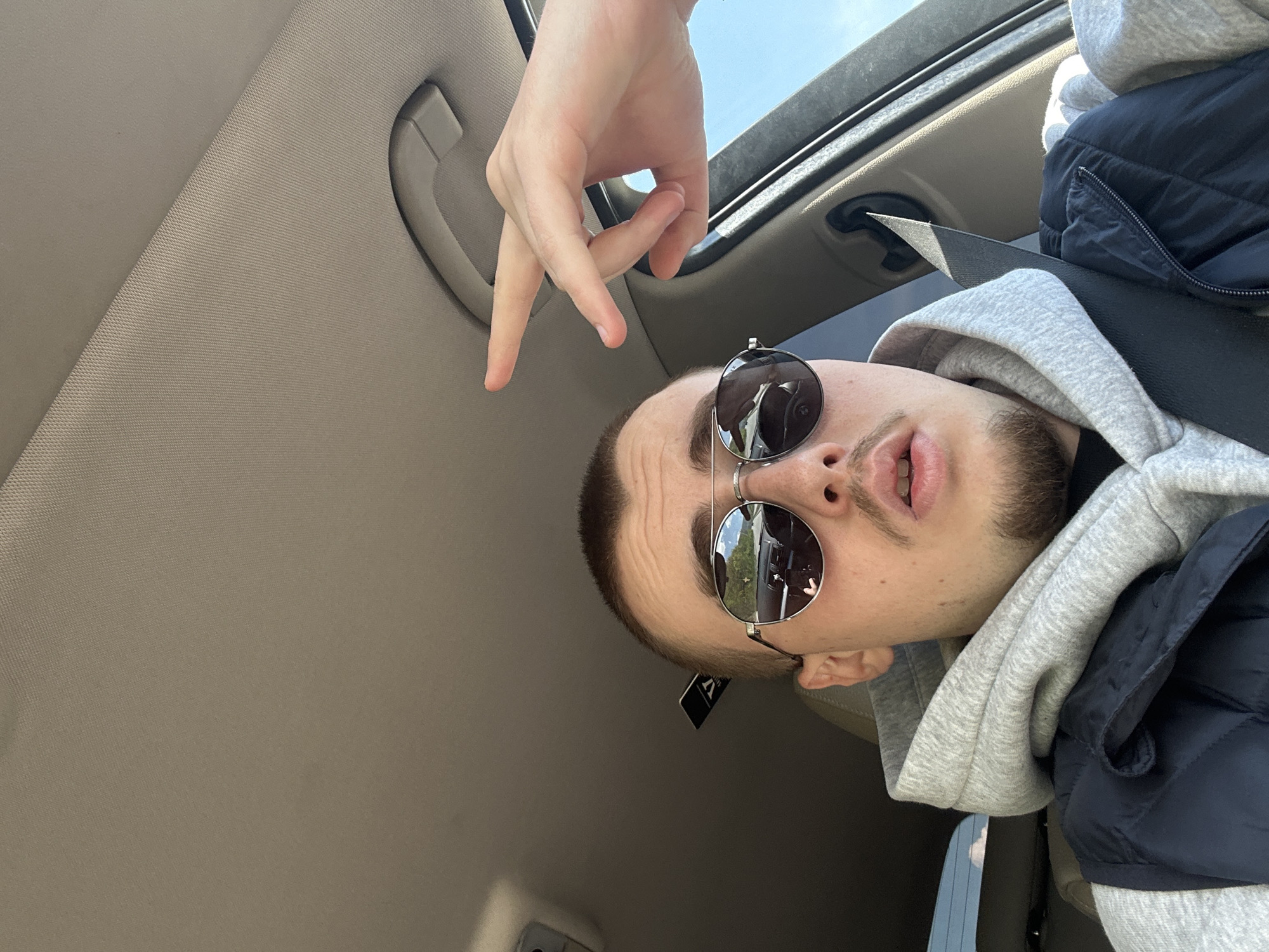 Driver spotted in BMW with open sunroof in Sofia