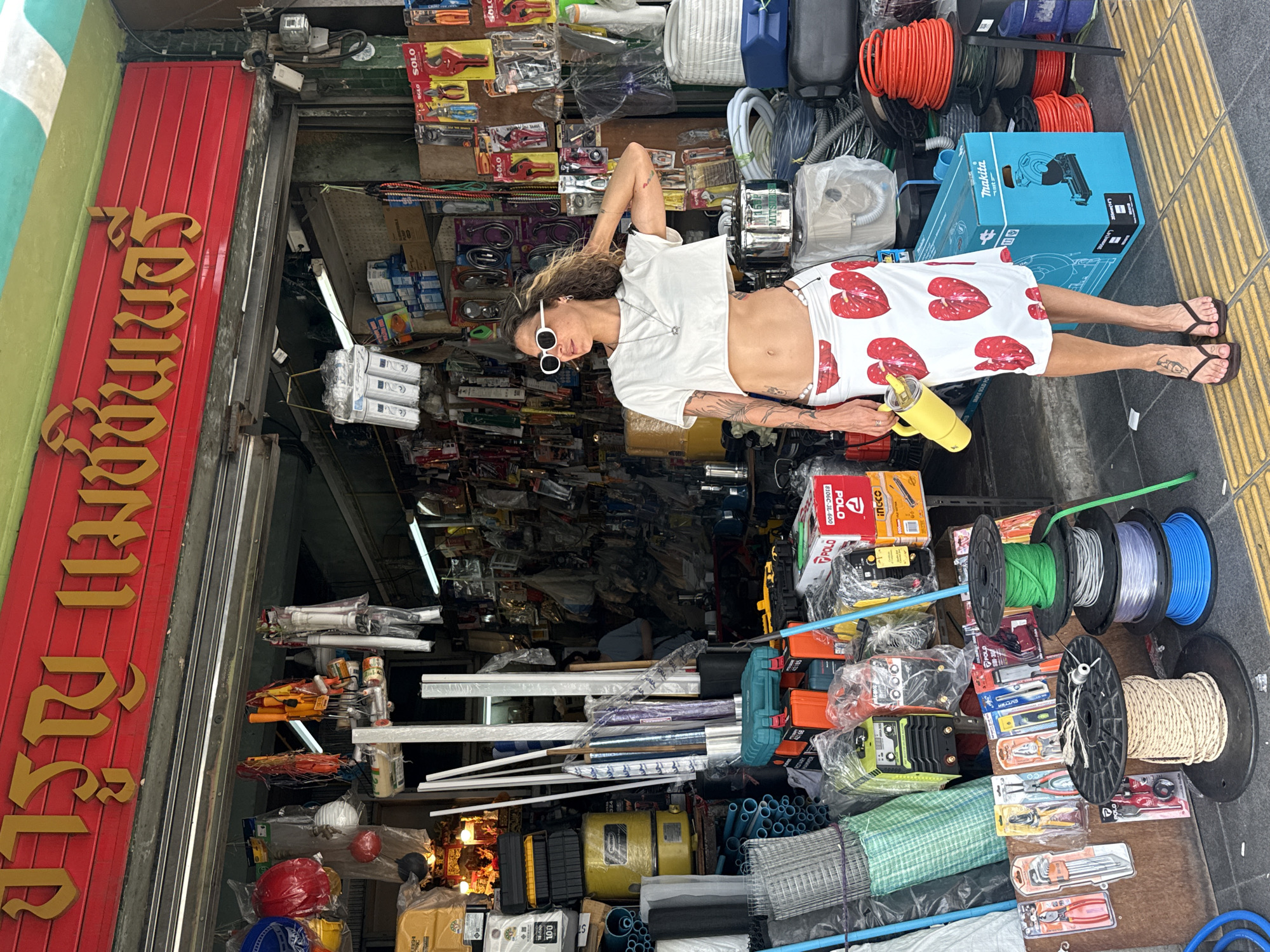 Bangkok hardware store corner, street-level morning snapshot