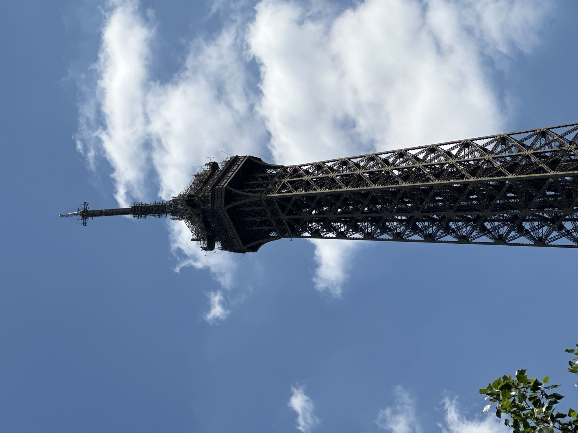 Seine River traffic near the Eiffel Tower on a sunny afternoon