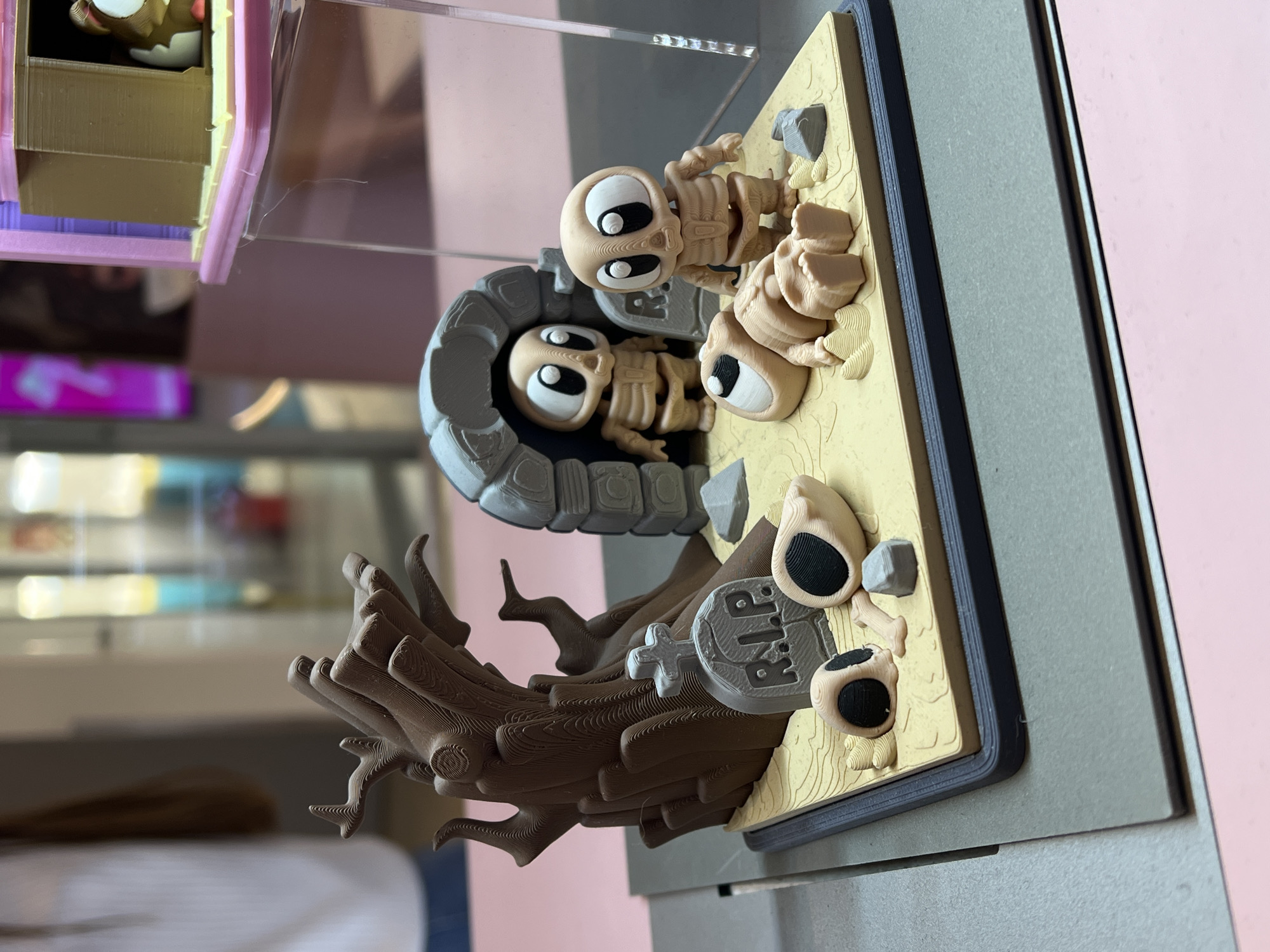 3D-printed graveyard diorama with skeletons displayed in Khimki
