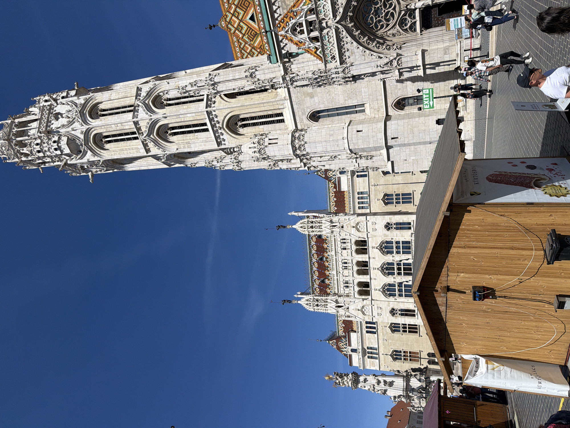 Tourist documents Budapest landmarks during sunny morning walk