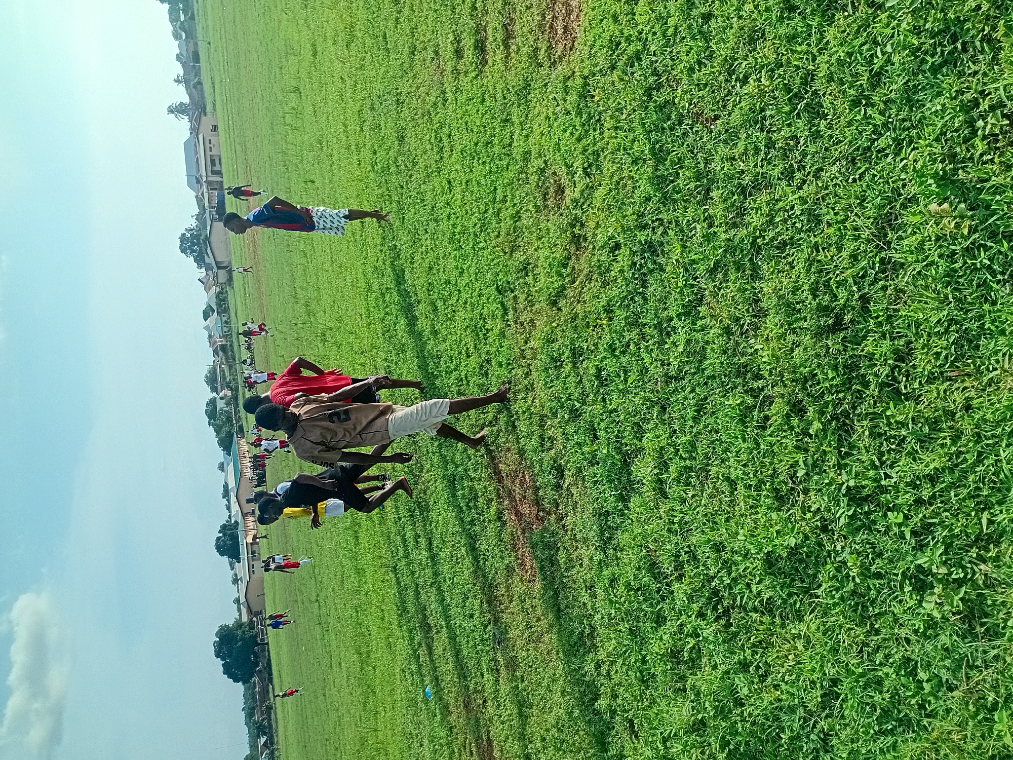 Football team trains on community field in Ogbogbo, Nigeria