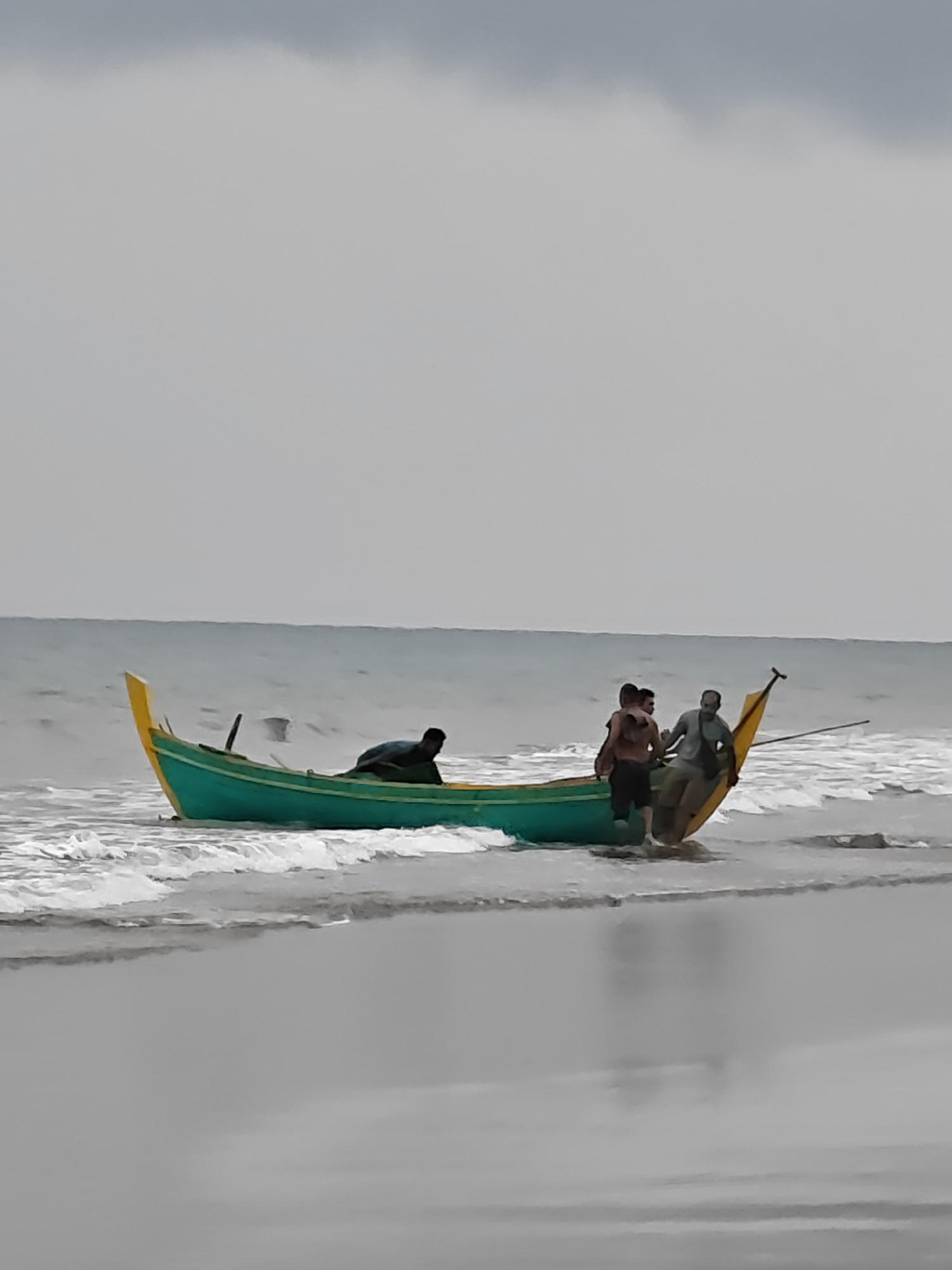 Fresh catch lands on a Curehtunong beach at dawn