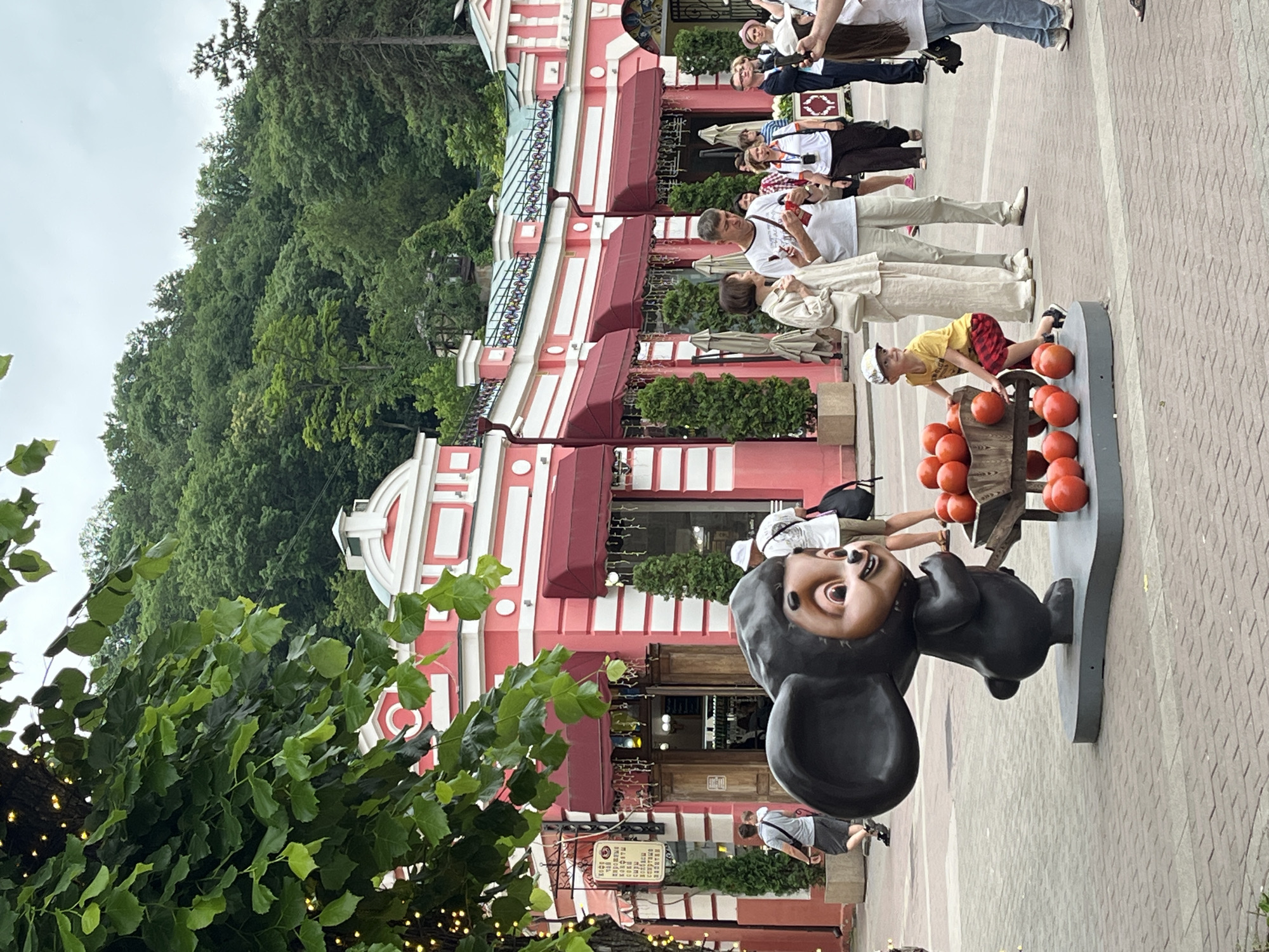 Strolling Kislovodsk's pedestrian promenade on a cloudy summer day