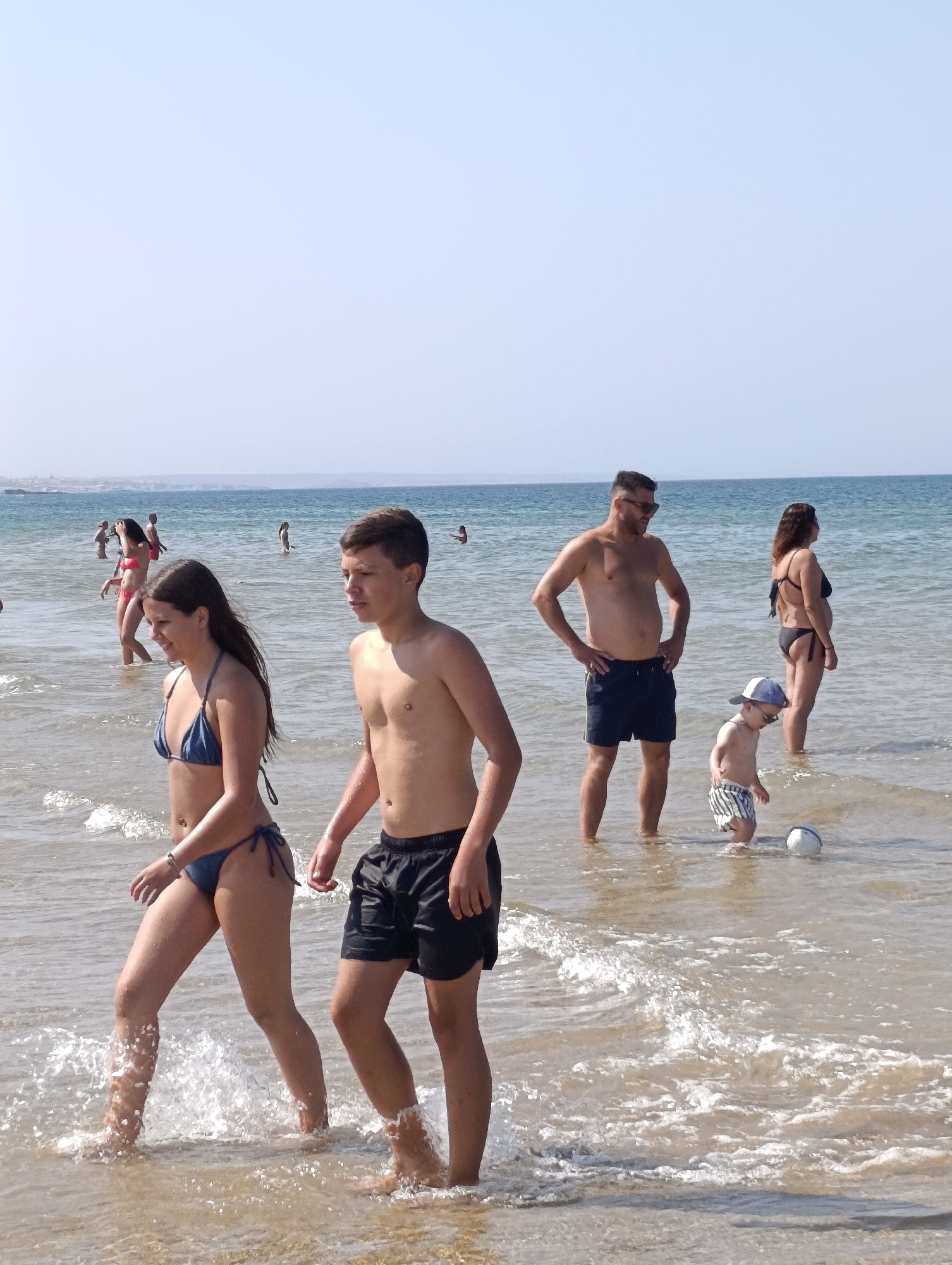 Busy summer morning on the beaches of Sines, Portugal