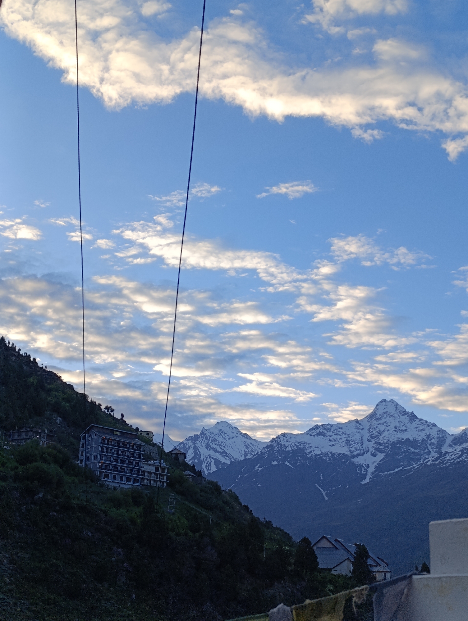 Buddhist stupas and snow peaks in the Himalayas near Kardang