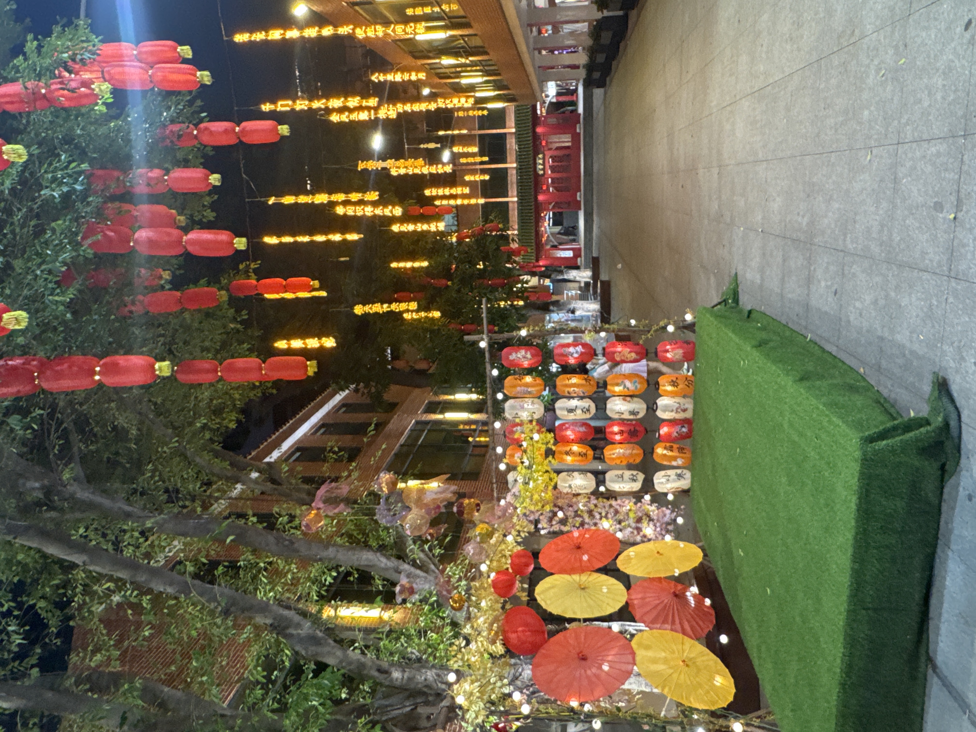 Festival decorations and nighttime cityscape observed in Yuexiu District