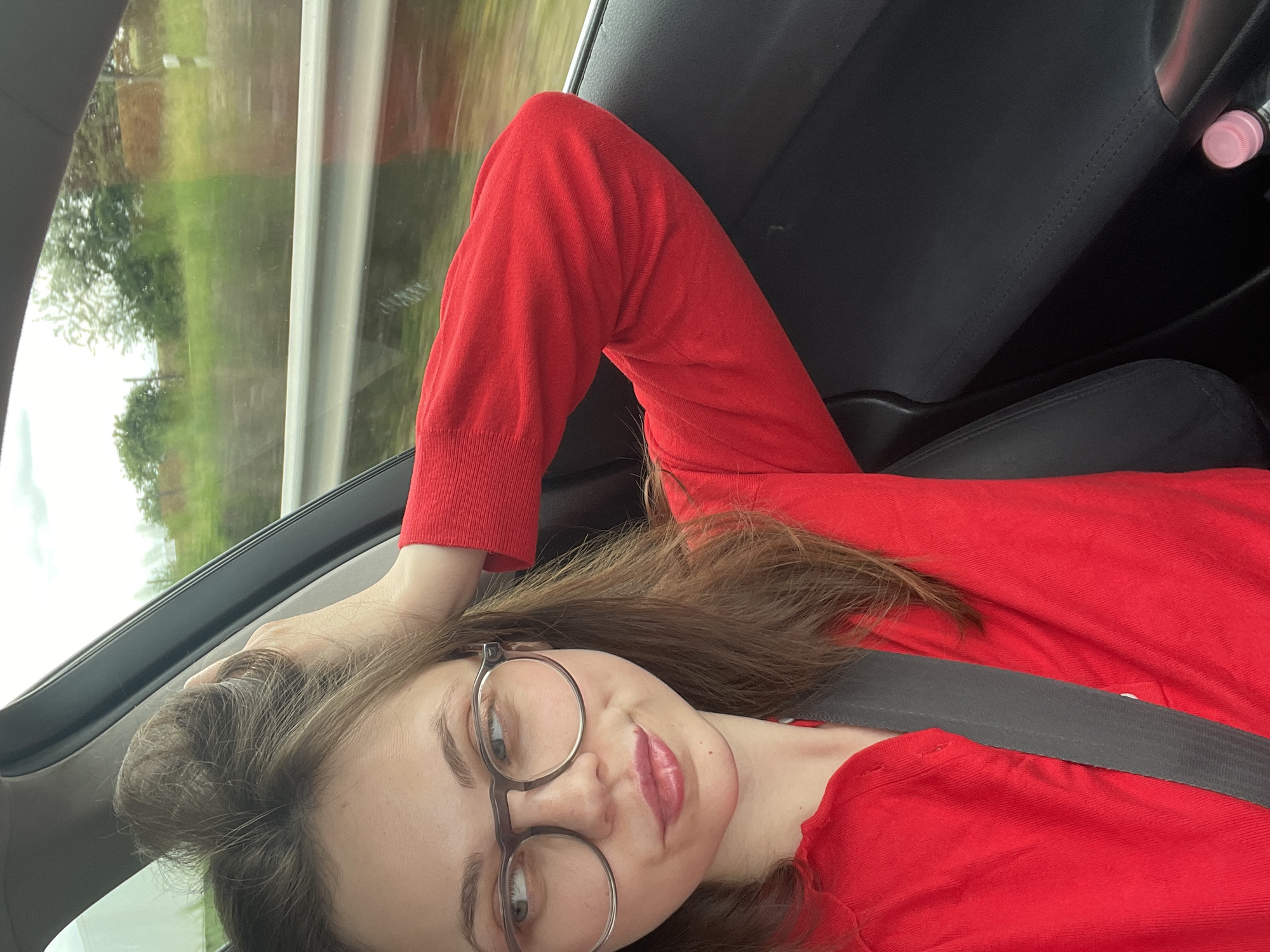 Woman in red observed driving through Kőszárhegy, Hungary