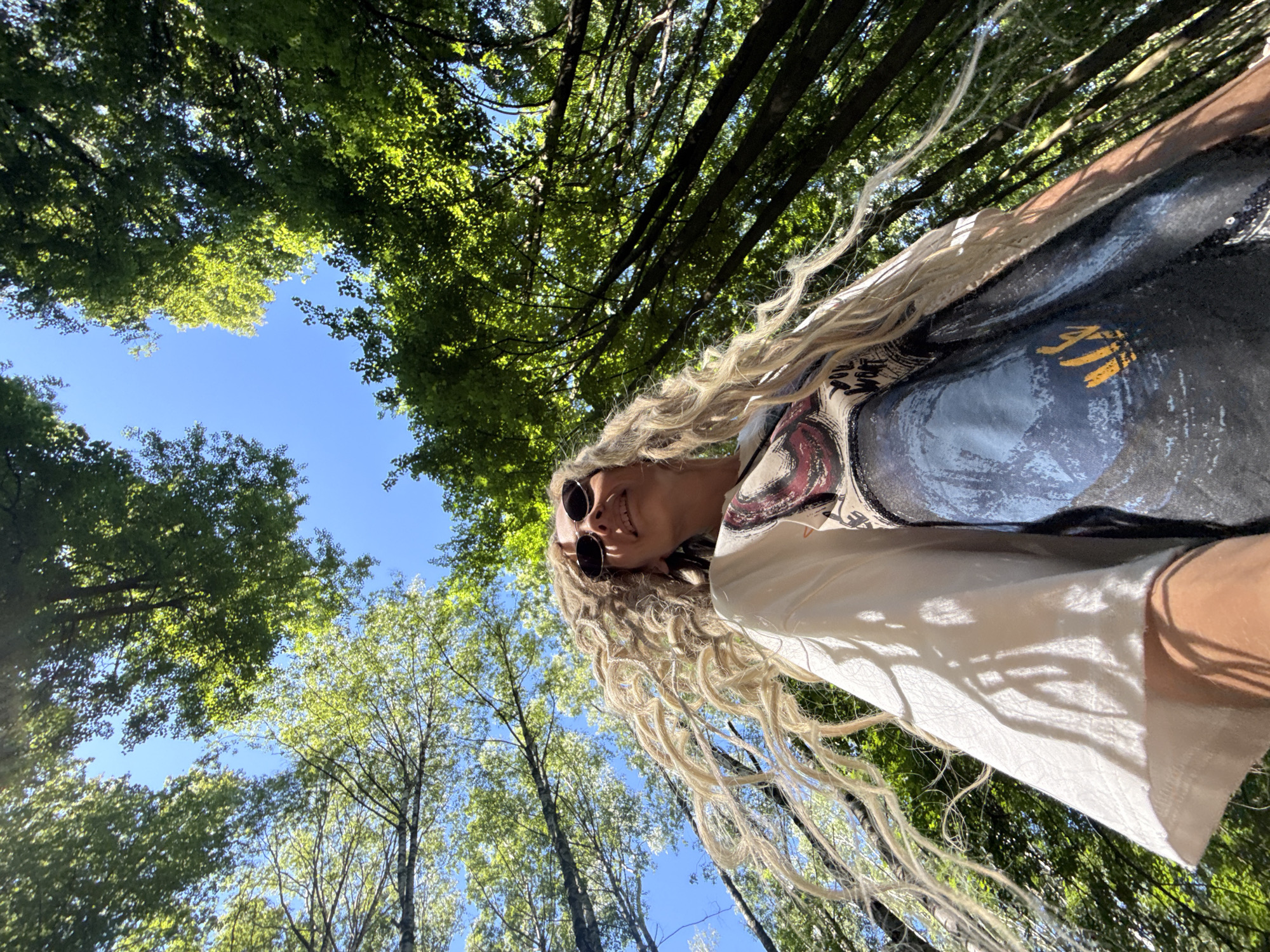 Woman photographed in forest during early morning in Rusanovo