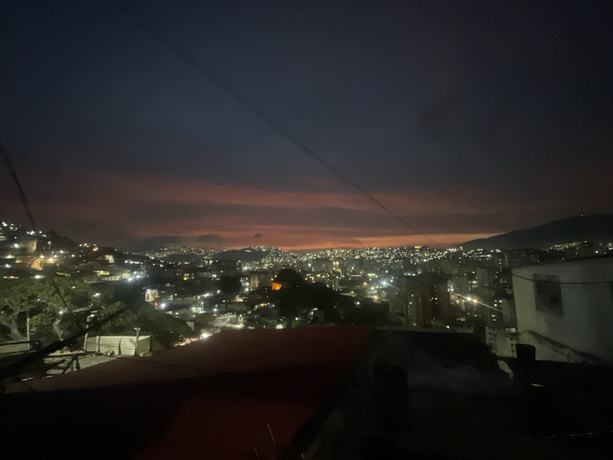 Nighttime Caracas cityscape captured from elevated viewpoint