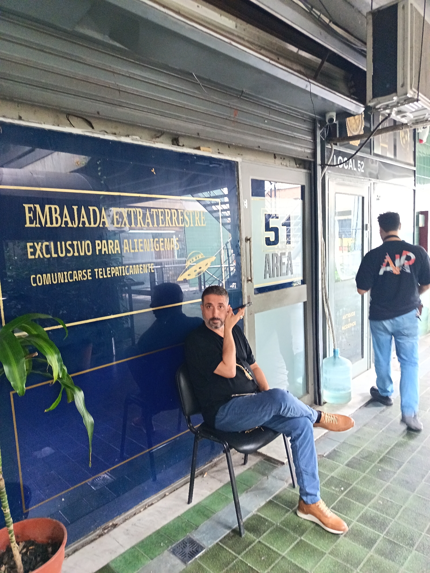 Buenos Aires business displays "Extraterrestrial Embassy" storefront sign